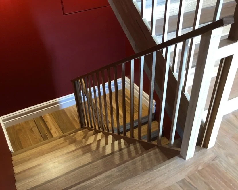 custom stair case servicing the second story renovation