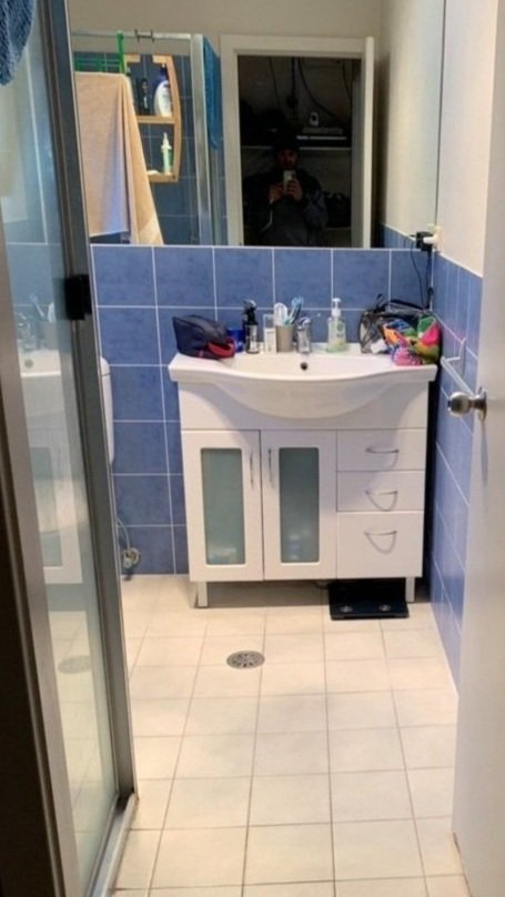 before photo of a dated bathroom