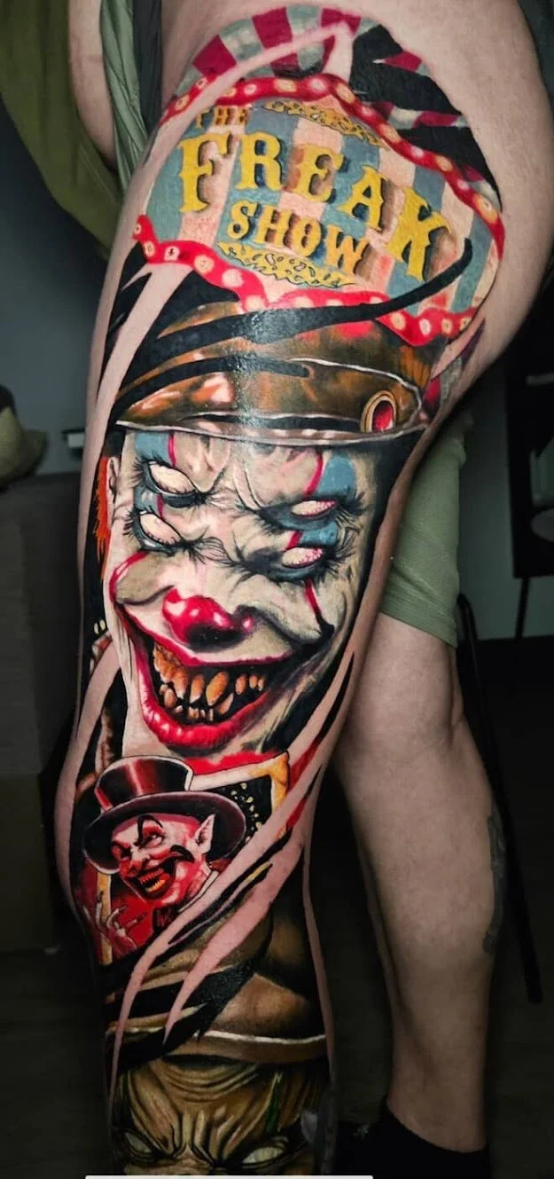 A tattoo sleeve featuring a clown with a menacing smile, red nose, and clown makeup, with a smaller image of a smiling woman in a hat below.