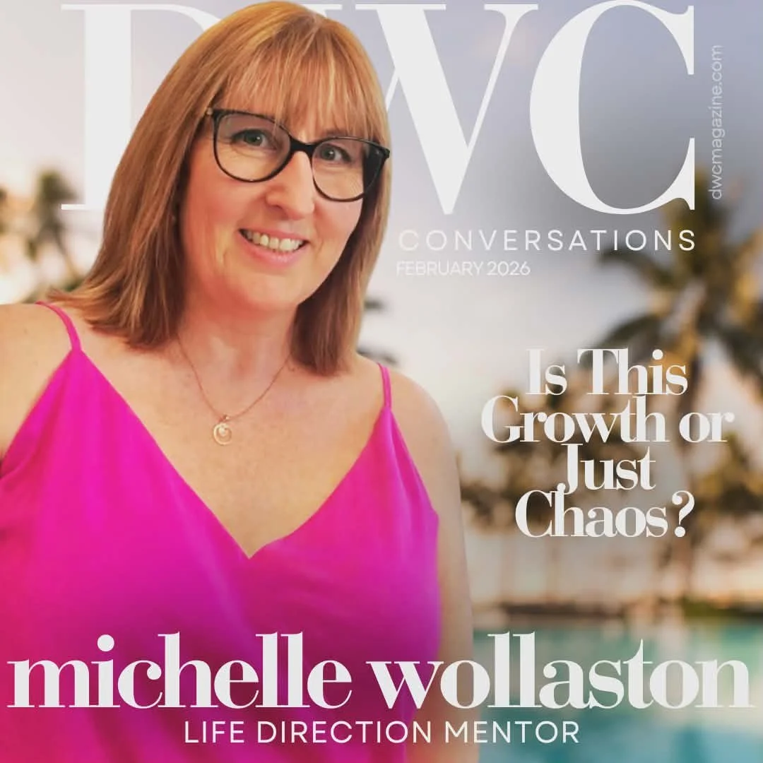 Magazine cover featuring a woman with shoulder-length red hair, wearing black glasses and a pink sleeveless top. The cover text includes "Michelle Wollaston," "Life Direction Mentor," and a headline "Is This Growth or Just Chaos?" with a background showing a blurred outdoor scene.