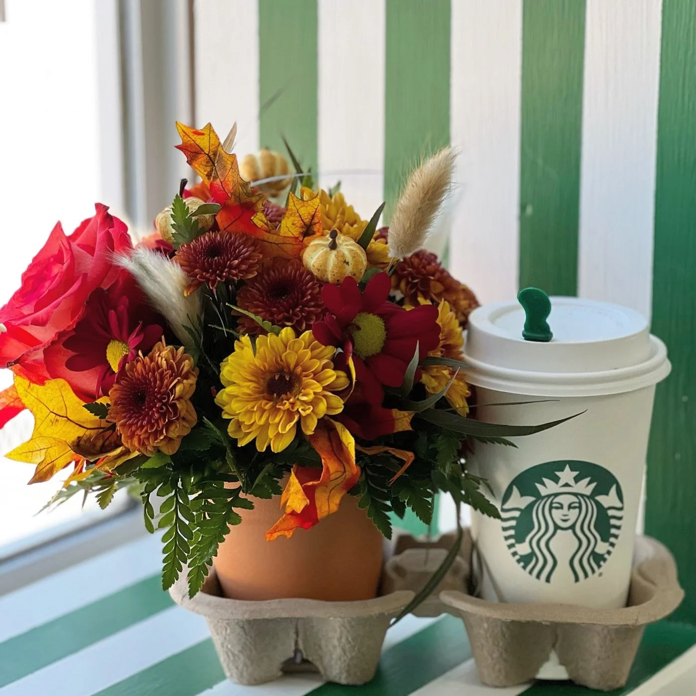A fall favorite, reimagined. Our Pumpkin Spice arrangement pairs seasonal blooms with a Grande PSL for the perfect autumn treat. 🎃🍁