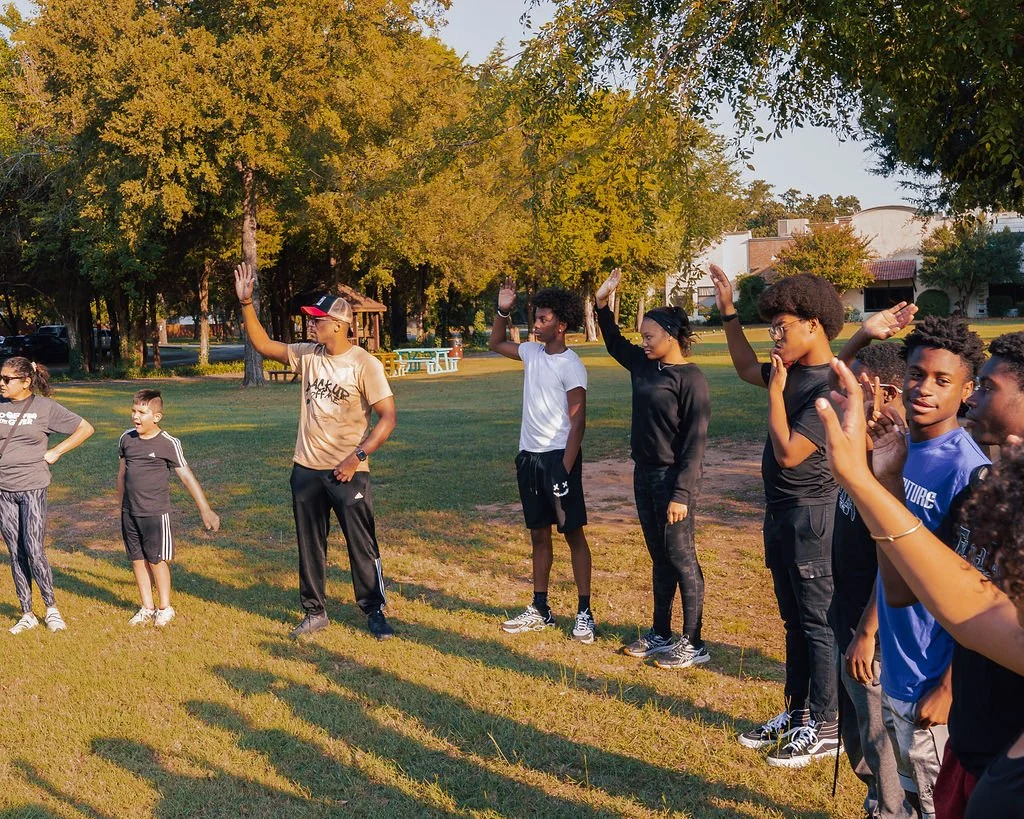 Teens taking part in an outdoor group activity
