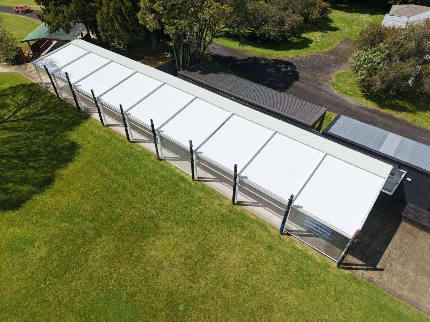 Long covered walkway roof after treatment