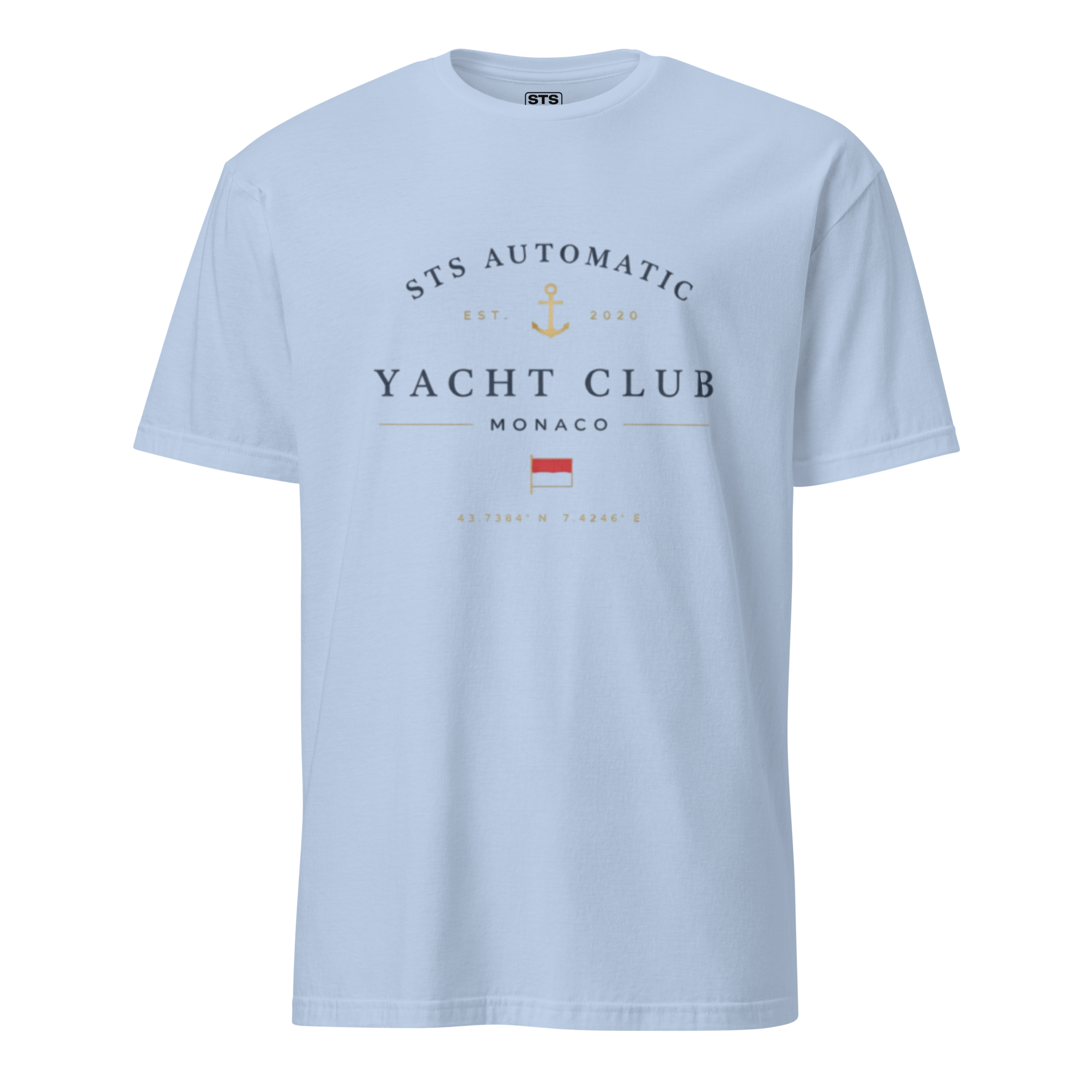 White T-shirt with navy text and a yellow anchor graphic that reads "STS Automatic Est. 2020 Yacht Club Monaco" and features a small red and white flag along with coordinates.