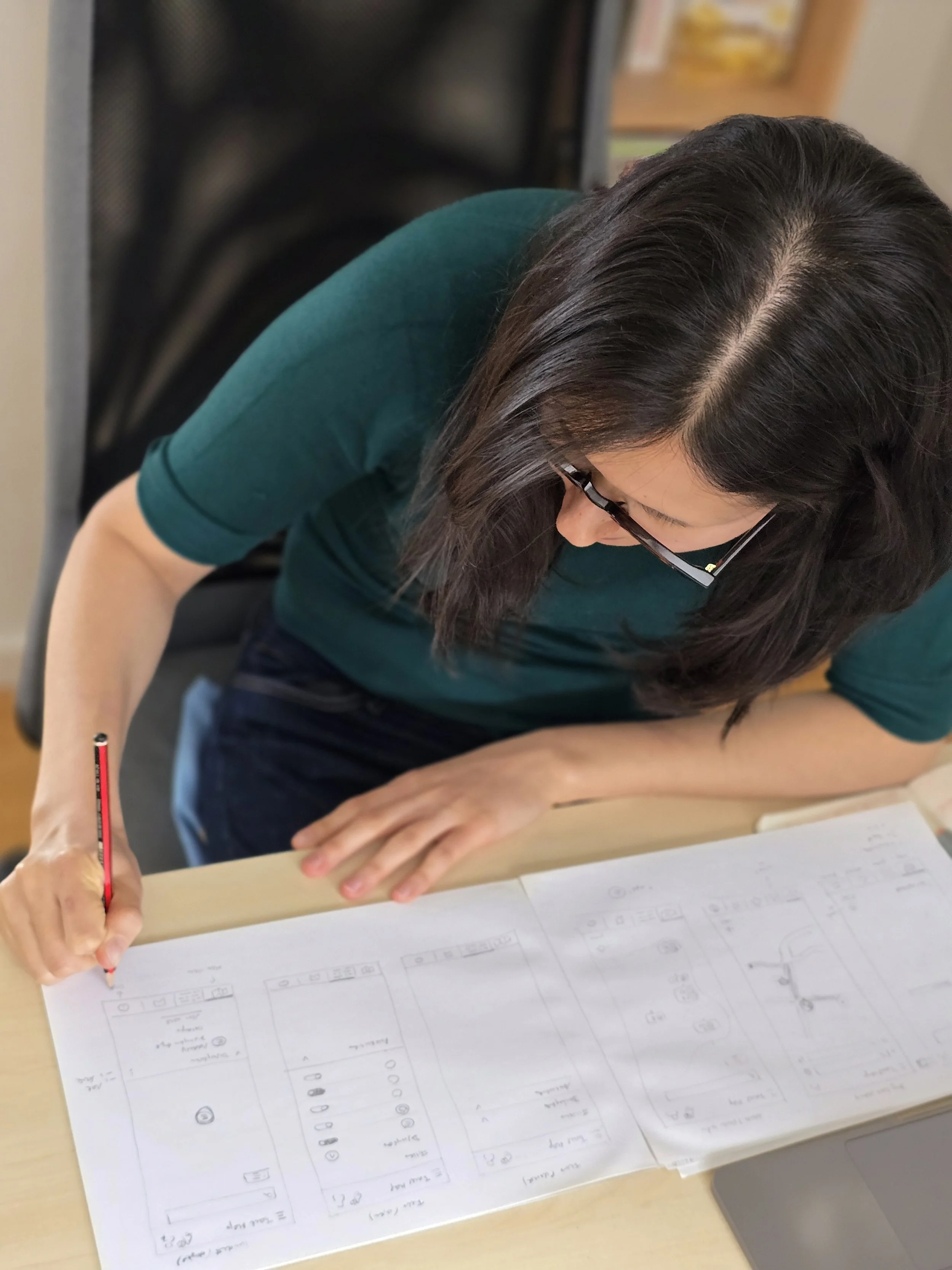 Photo of person creating wireframes