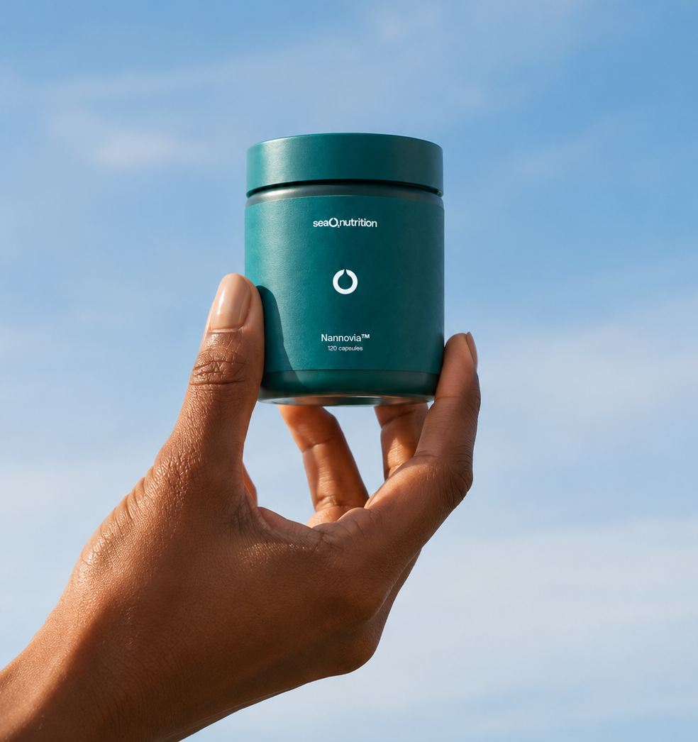 Teal Wellness Jar Beneath Blue Skies.png