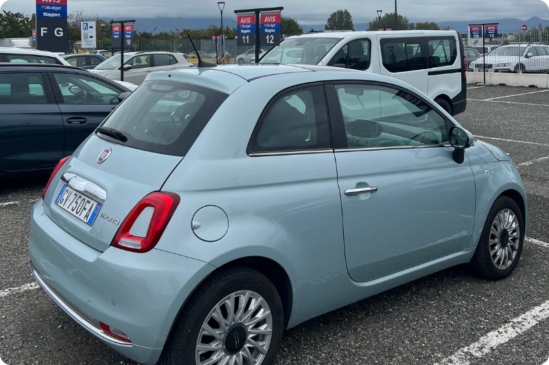 Classic Fiat 500 parked in Italy.