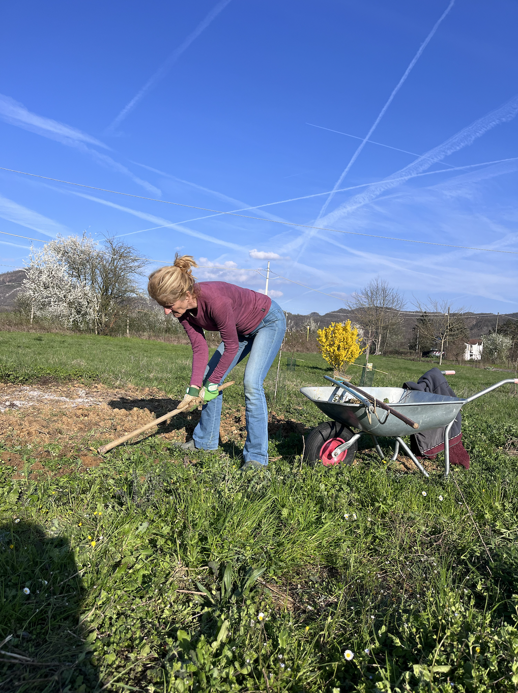 Woman working in the garden of our retreat center