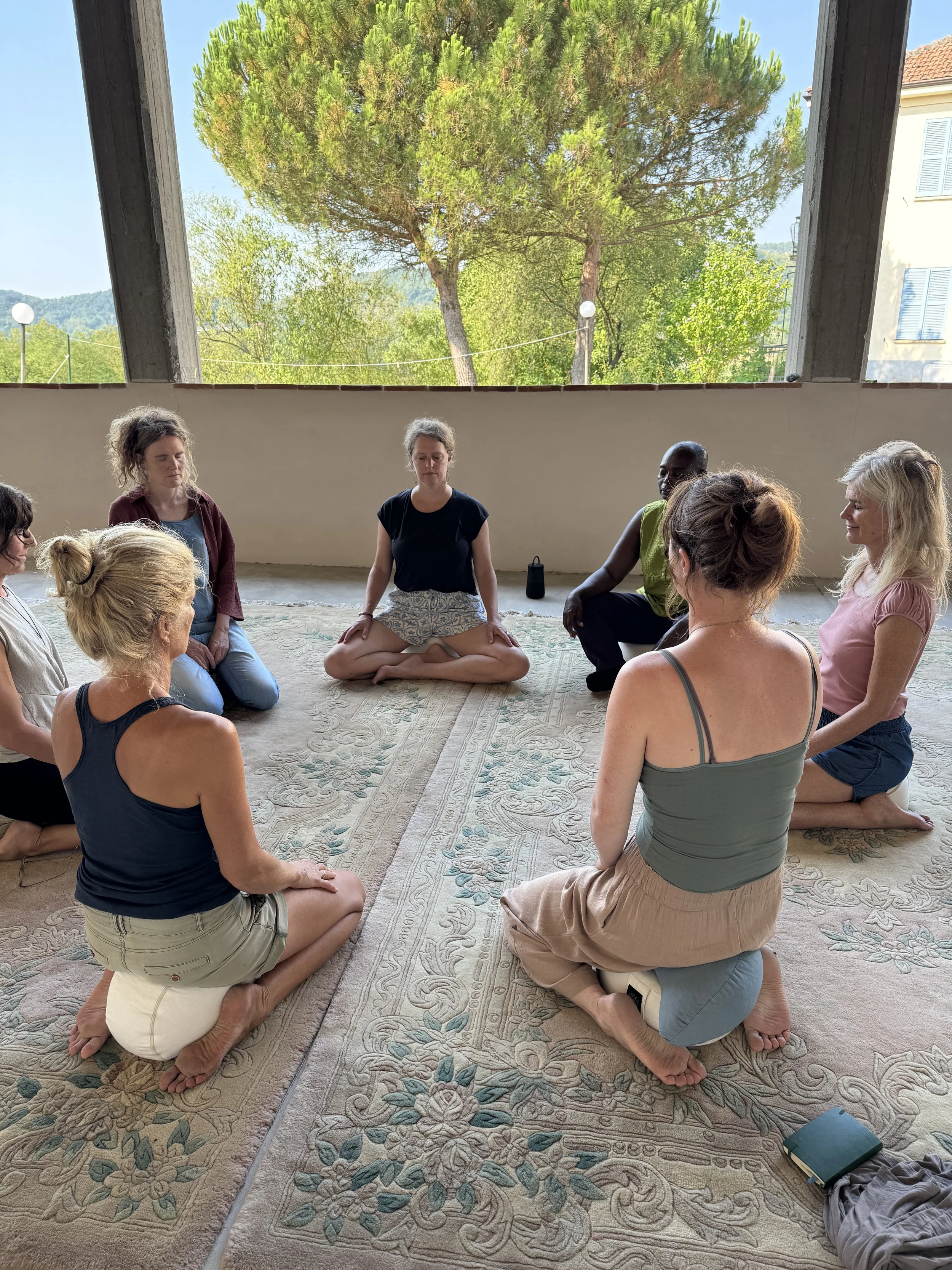 Meditating in open meditation hall