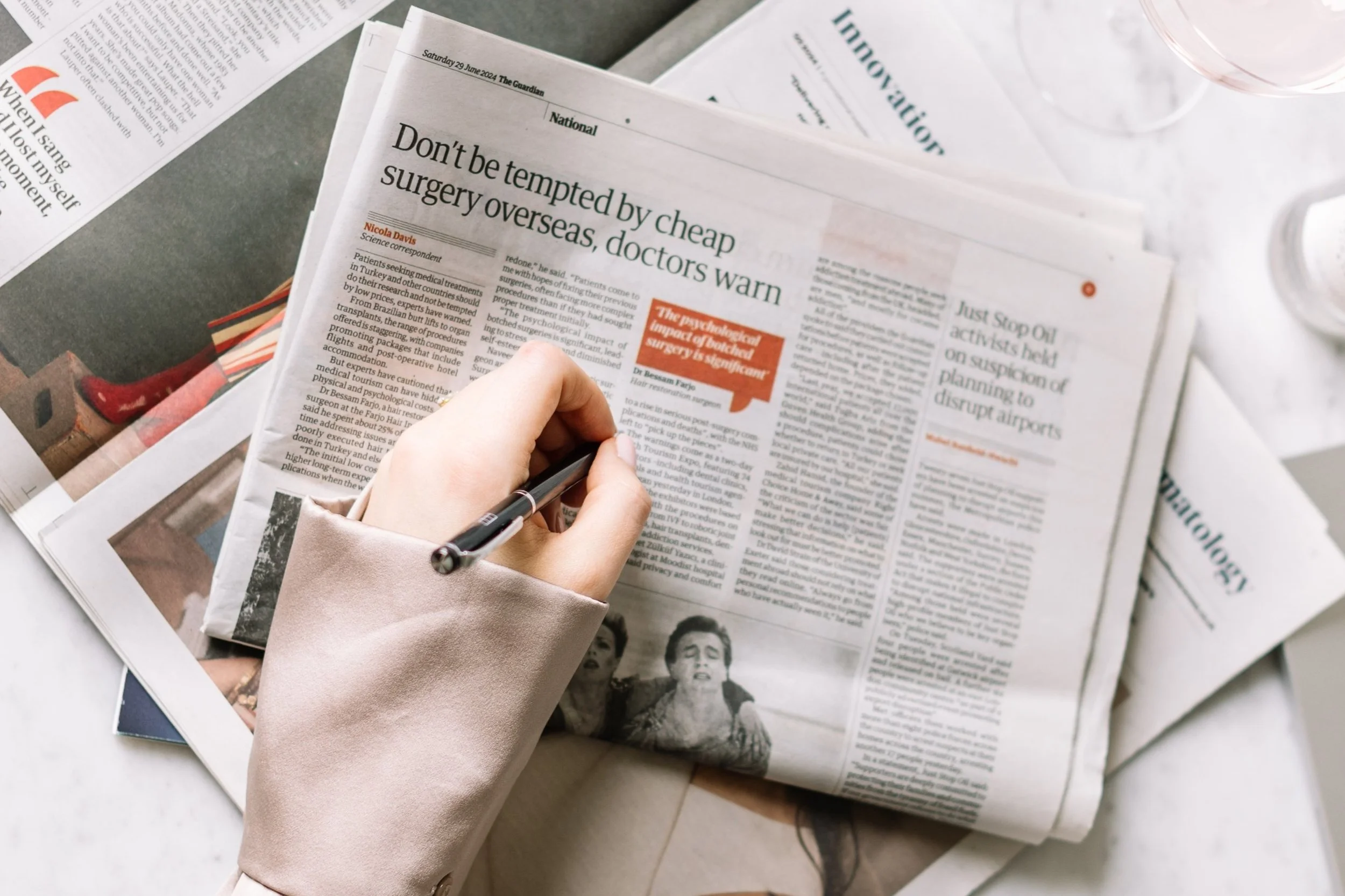 Stack of Tier-1 UK newspapers featuring healthcare PR coverage.