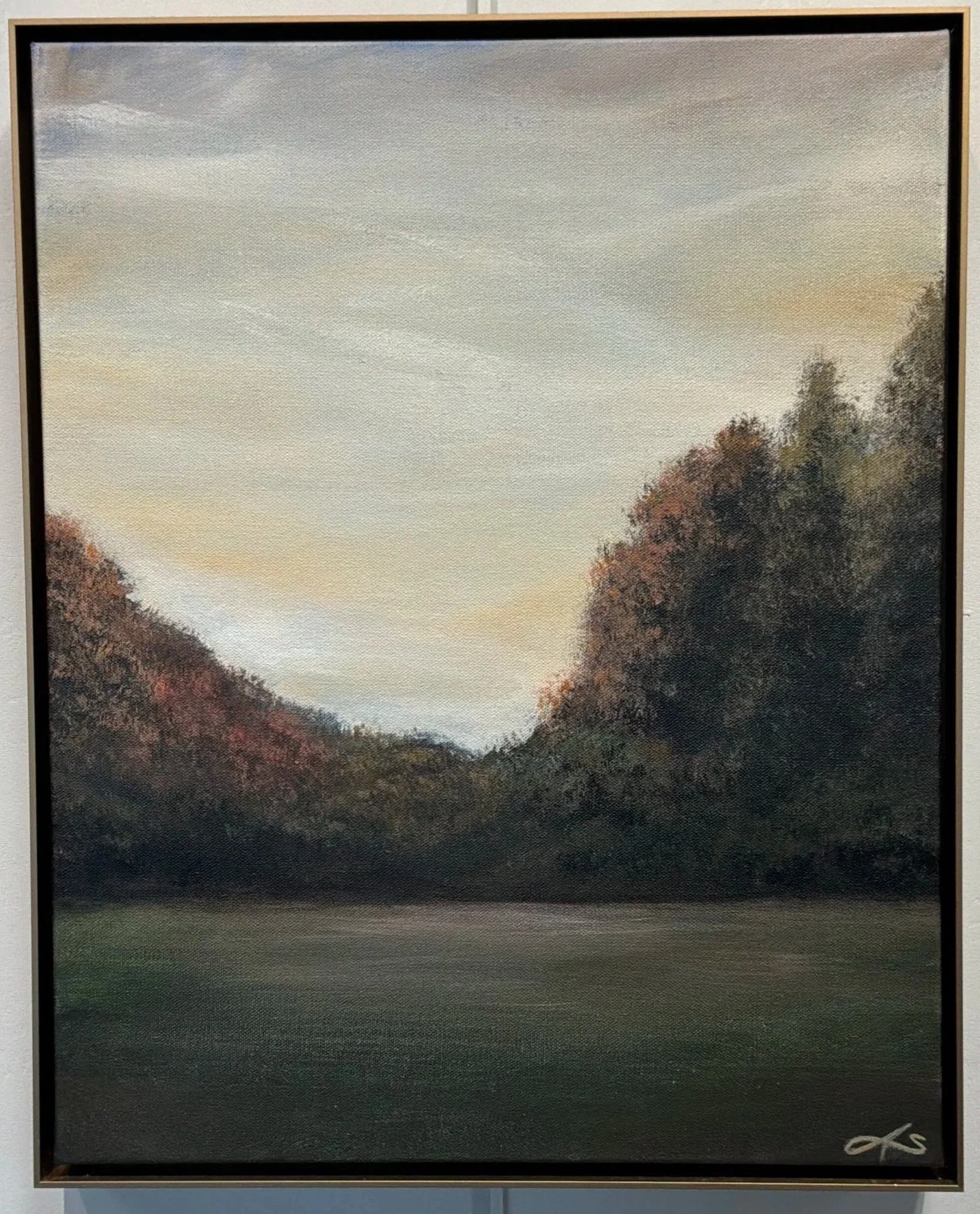 A landscape painting of a misty morning with trees on a hillside, painted in soft, muted colors.