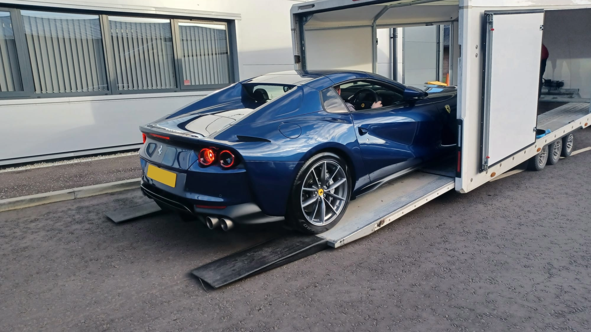 Spring Showers and Vehicle Transport: Why Covered Trailers Make a Difference