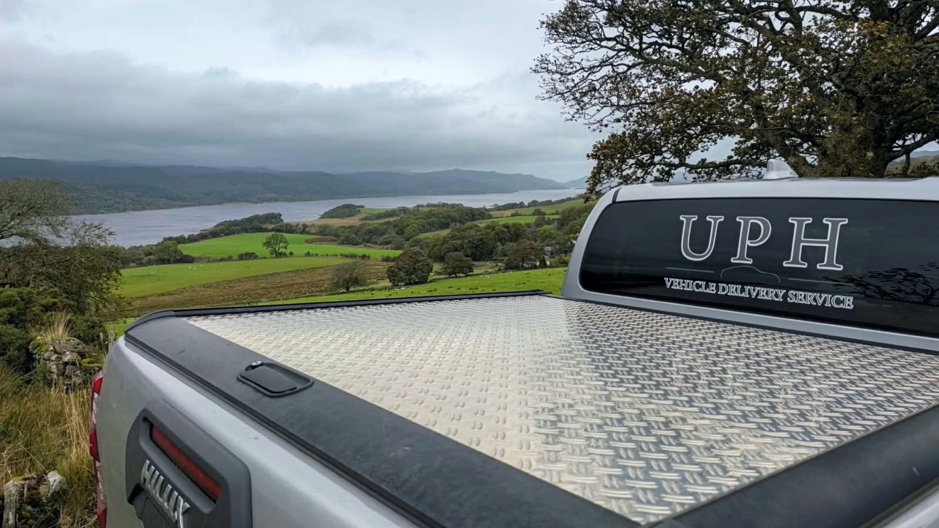 UPH Vehicle with stunning Scottish Highlands in background