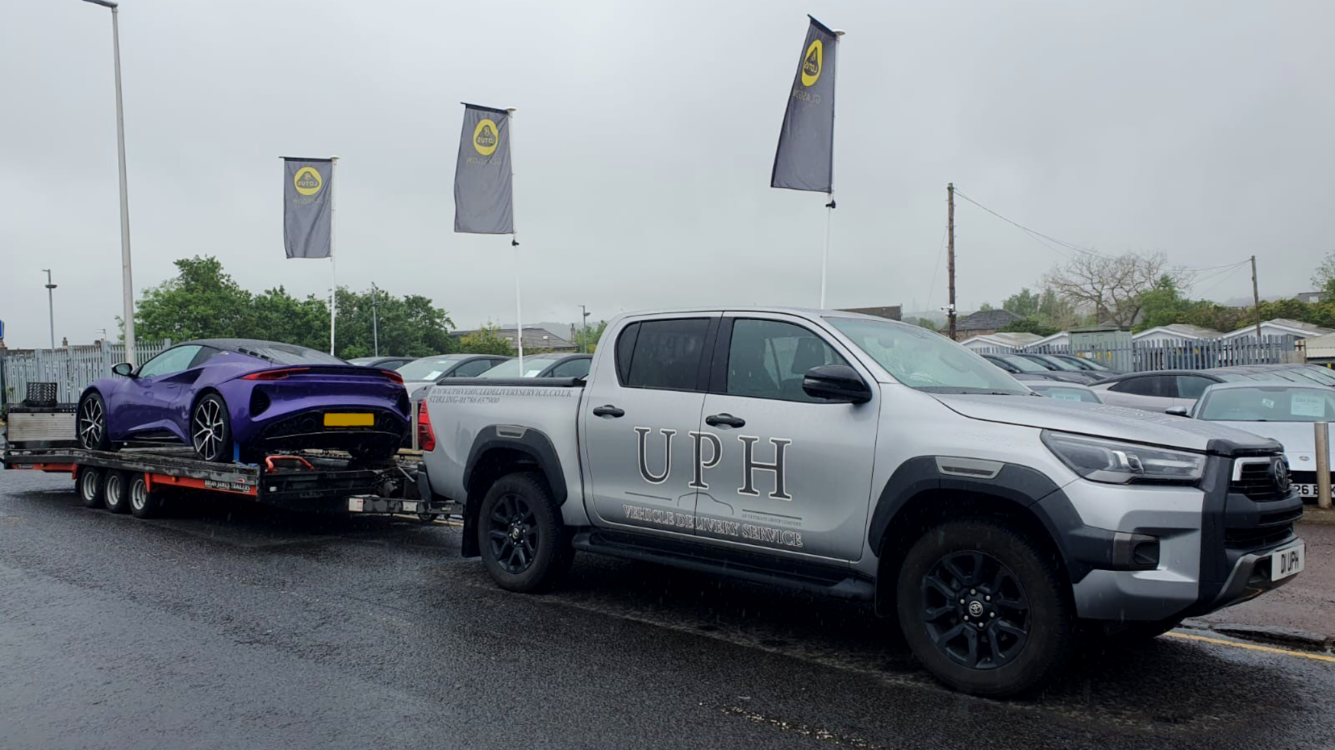 Luxury Vehicle on open car transporter