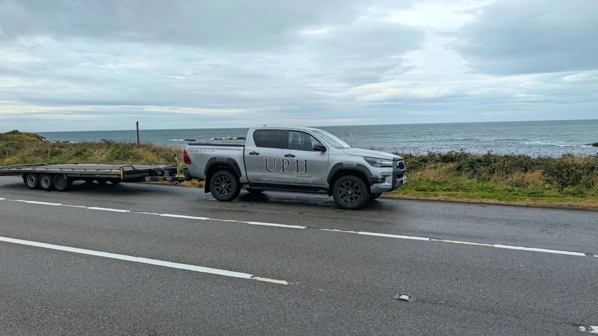 UPH Vehicle with stunning Scottish Highlands in background