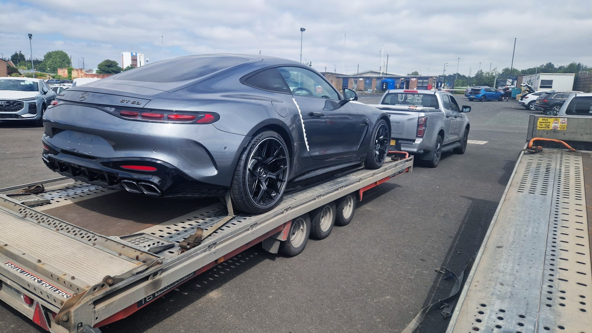 Mercedes-Benz vehicle on open car transporter