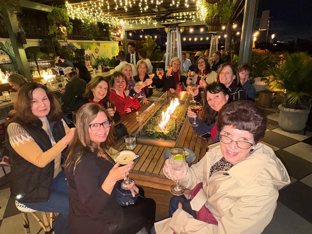 Savannah ladies at rooftop table with fire.jpg