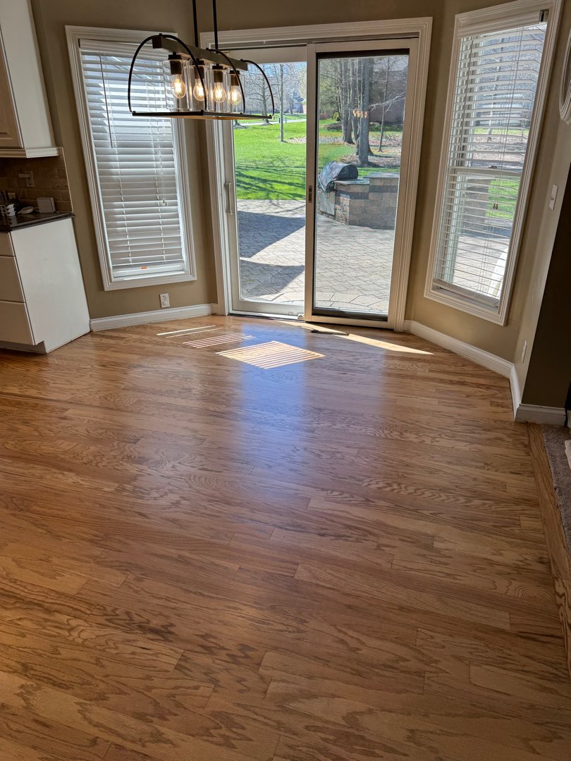 Red oak wood with a duraseal weathered oak stain. Floor installation in a private residence.