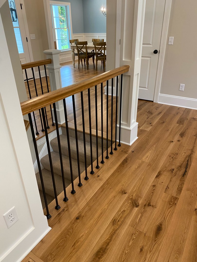 Oak wood with a natural finish. Floor installation in a private residence.