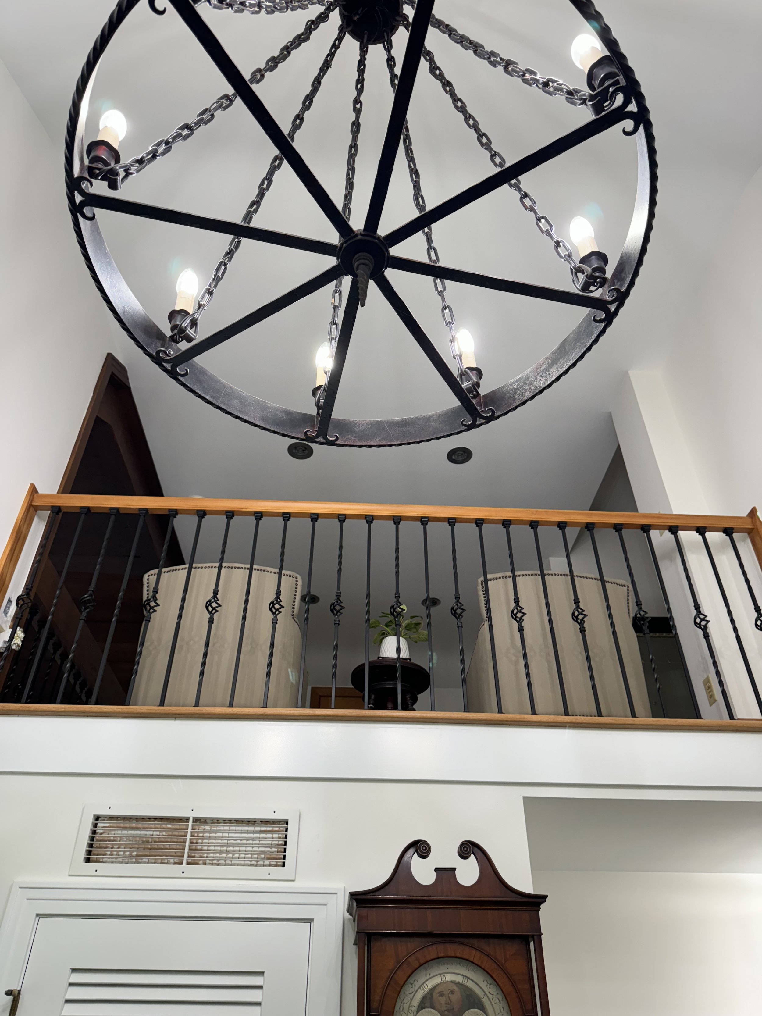 Douglas fir wood with a natural stain. Floor and stair installation with a matching railing in a private residence.