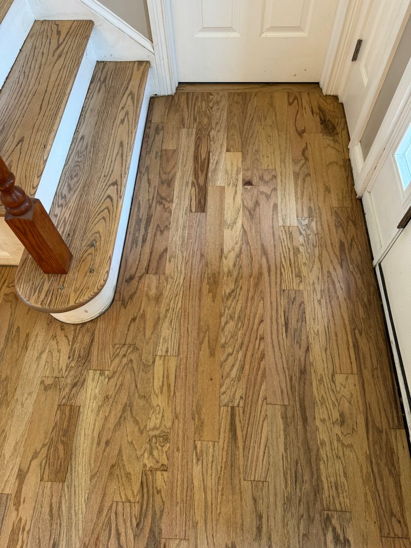 Red oak with a duraseal weathered oak. Floor and stair installation in a private residence.