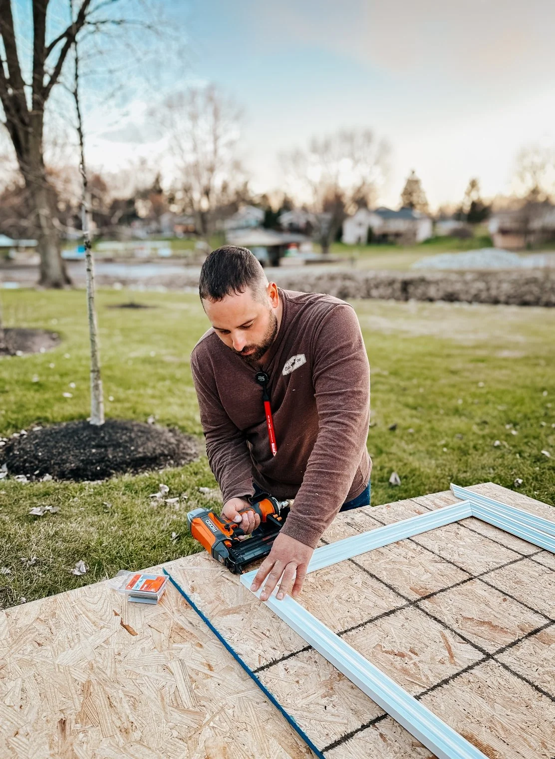 man building window frame