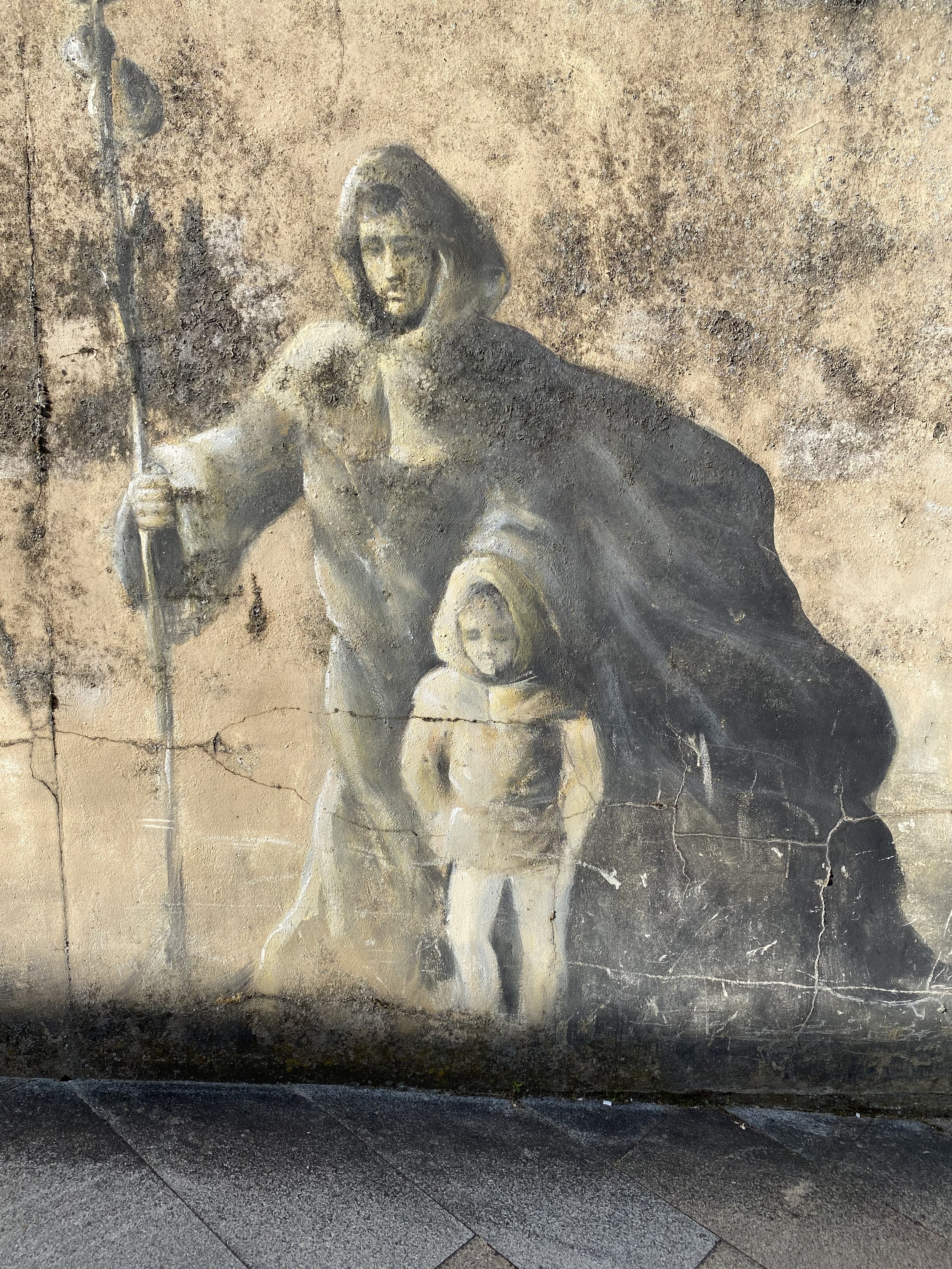 Mural of early pilgrims - Portomarín, Spain