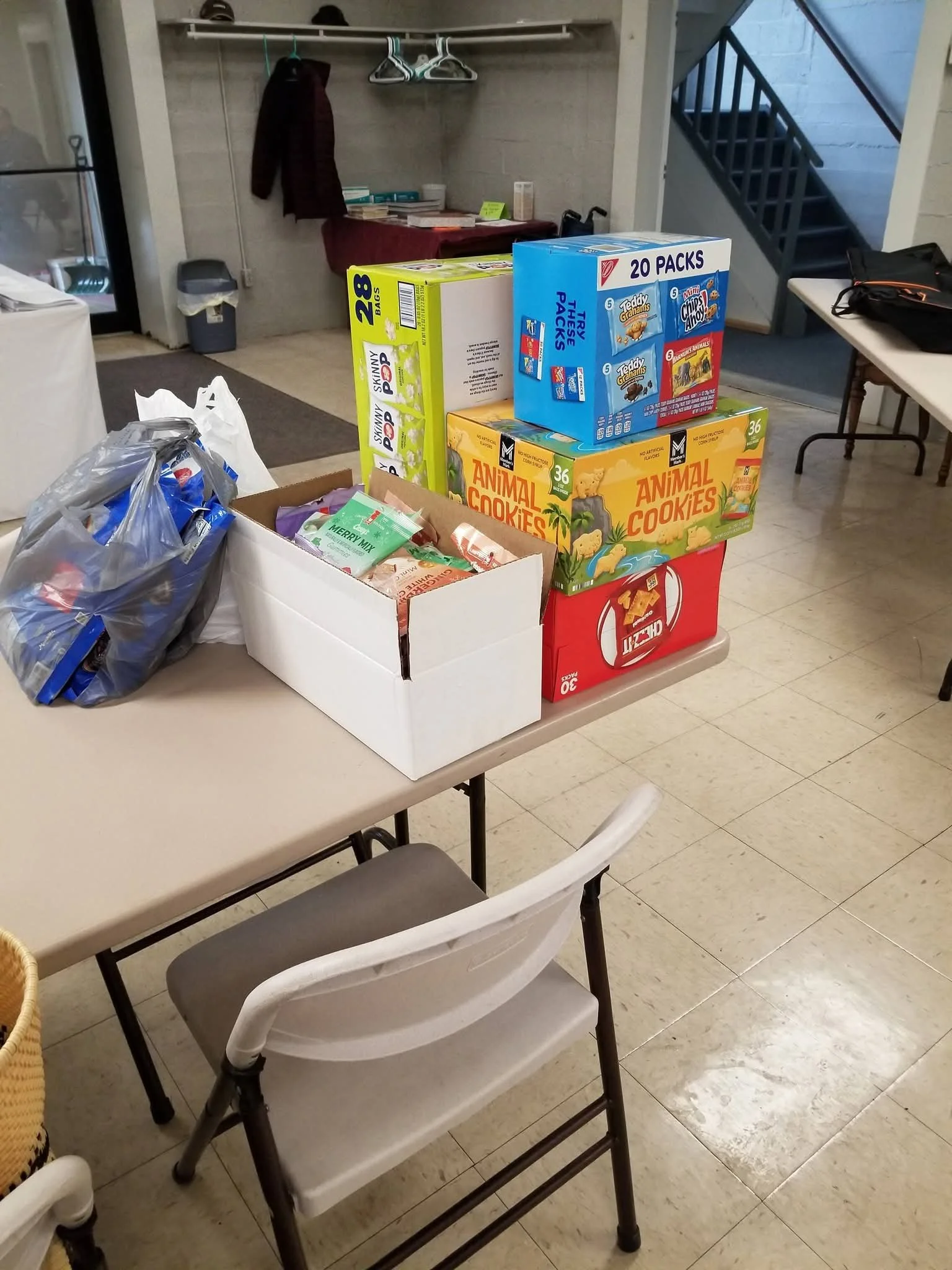 2026-1-11 Katherine with donations for Bible Group (2).jpg