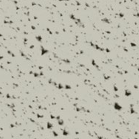 Surface en béton avec des taches noires