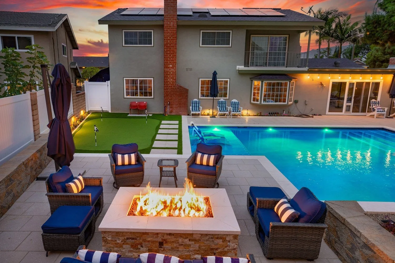 fullerton view from behind fire pit at night looking toward house.jpg