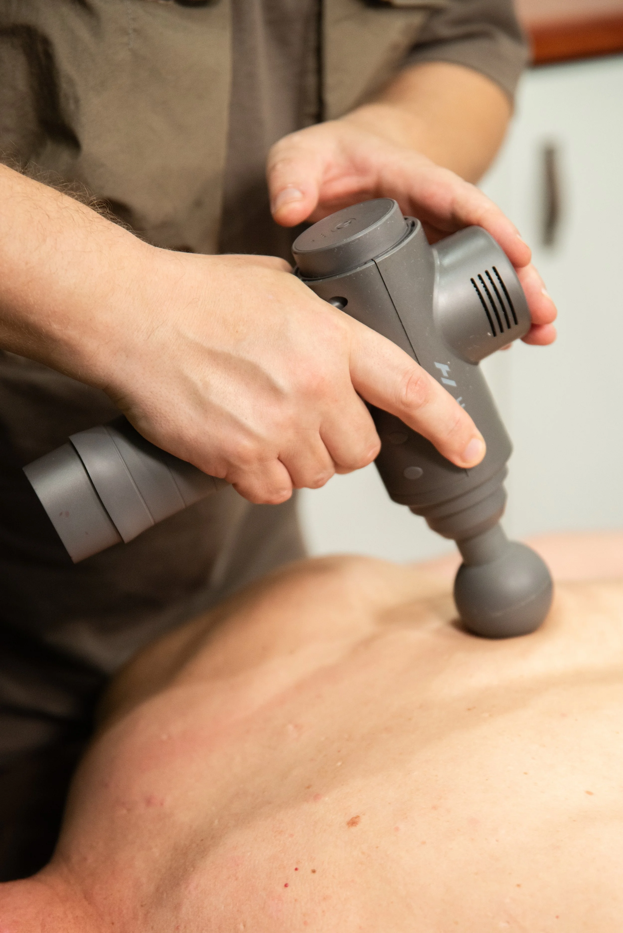 Percussion therapy MyoMassage Massage San Diego