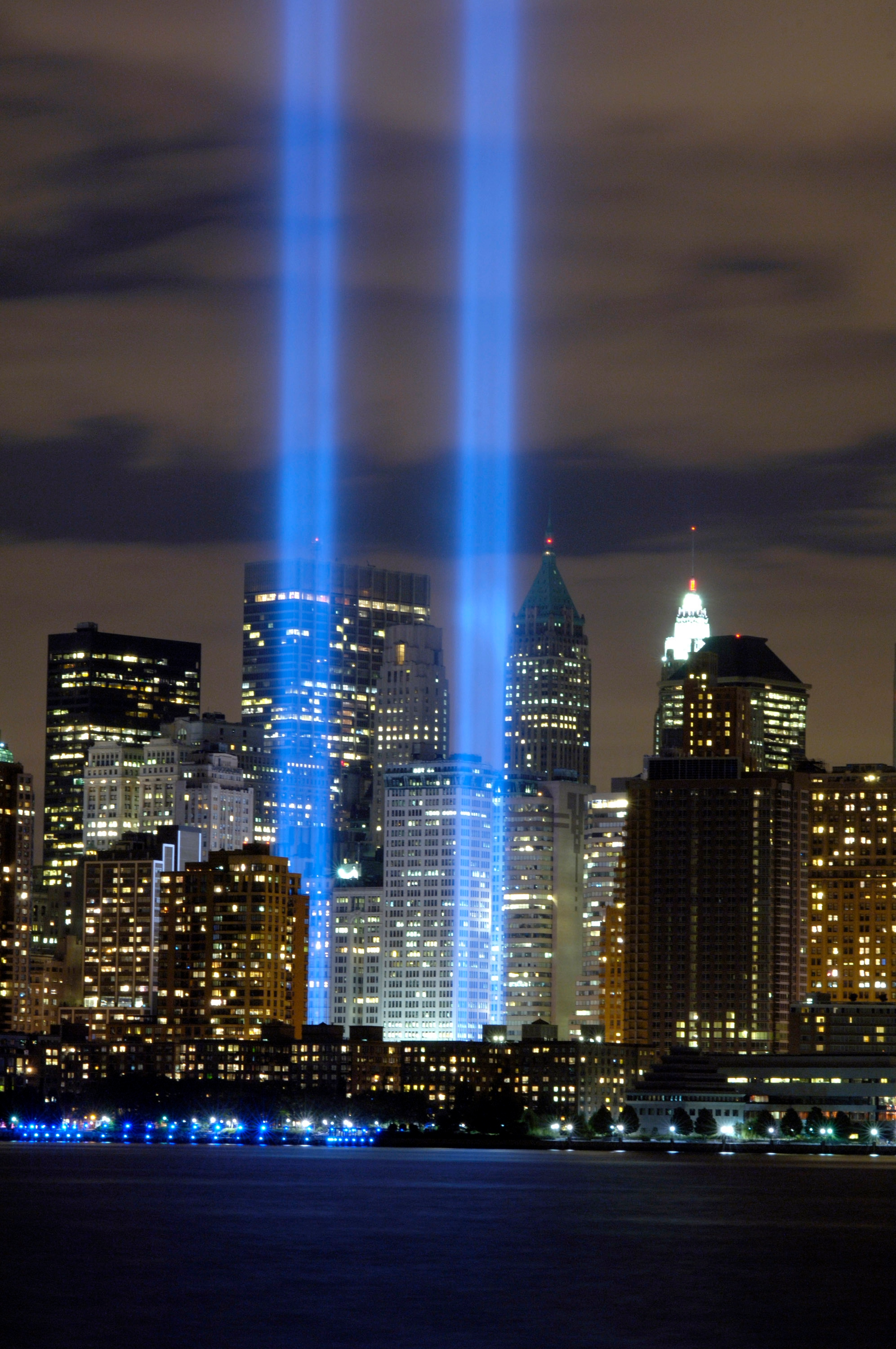 Two beams of light rising over lower Manhattan at the Tribute in Light memorial.