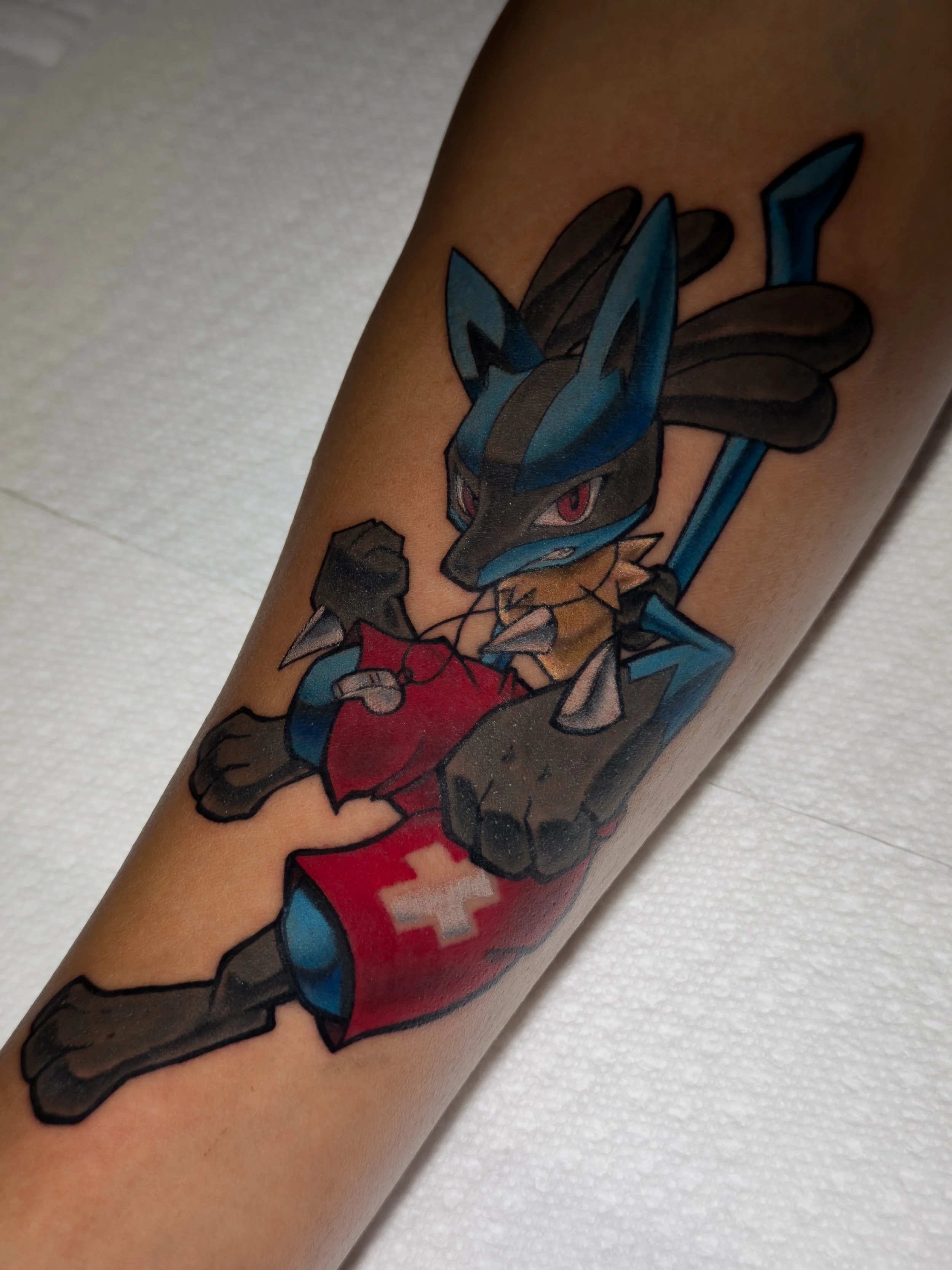 Got to make a Lifeguard Lucario and I&rsquo;m always down when a Pok&eacute;mon tattoo gets a little twist 😤🏖️

Also got to see the gamer Sandshrew all healed up 👾🎮😮&zwj;💨

And as always, we finished the session with a swipe of Mad Rabbit Repai