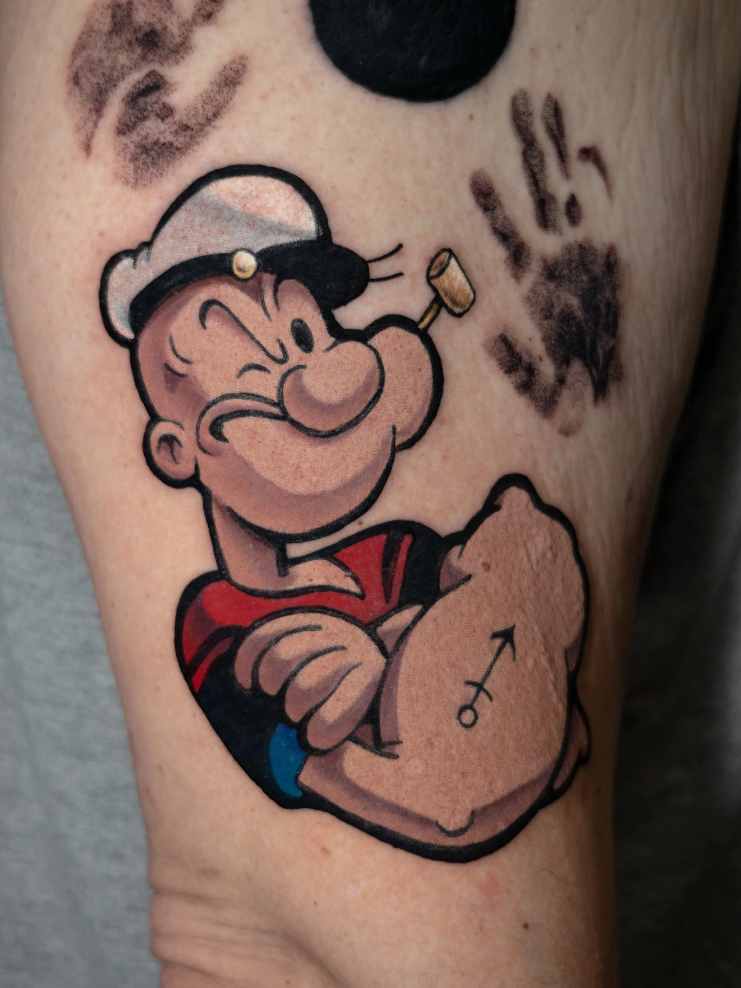 Got to go way back for this one with an American classic 💪🏻⚓️

You can&rsquo;t do Popeye the Sailor Man without breaking out the coils.

Also got to see this Notre Dame piece healed up after like 4 years and man&hellip; seeing tattoos settle in and