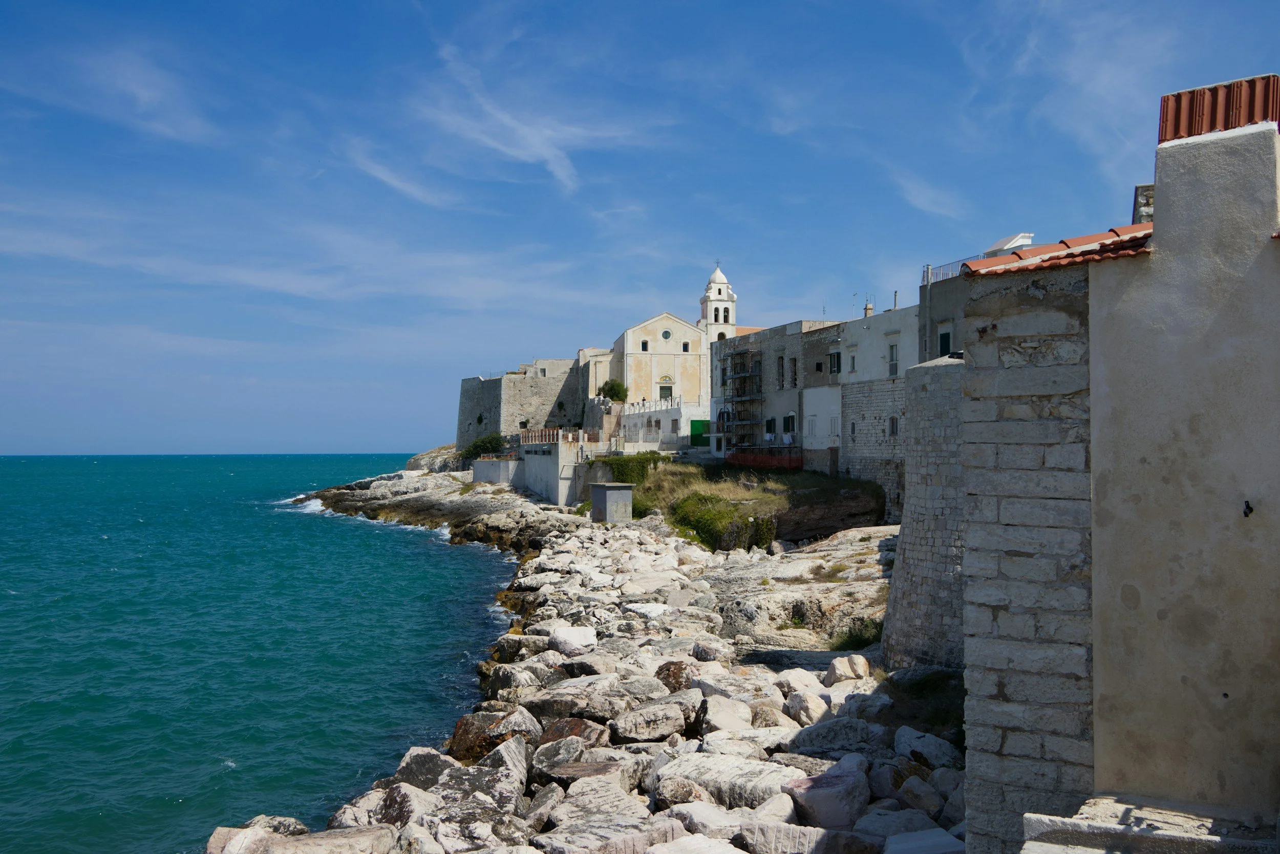 View of San Francesco Church, Vieste. Represents the Italian heritage and hospitality foundations of Project Manager Virginia Ragni. Expert in stakeholder diplomacy.