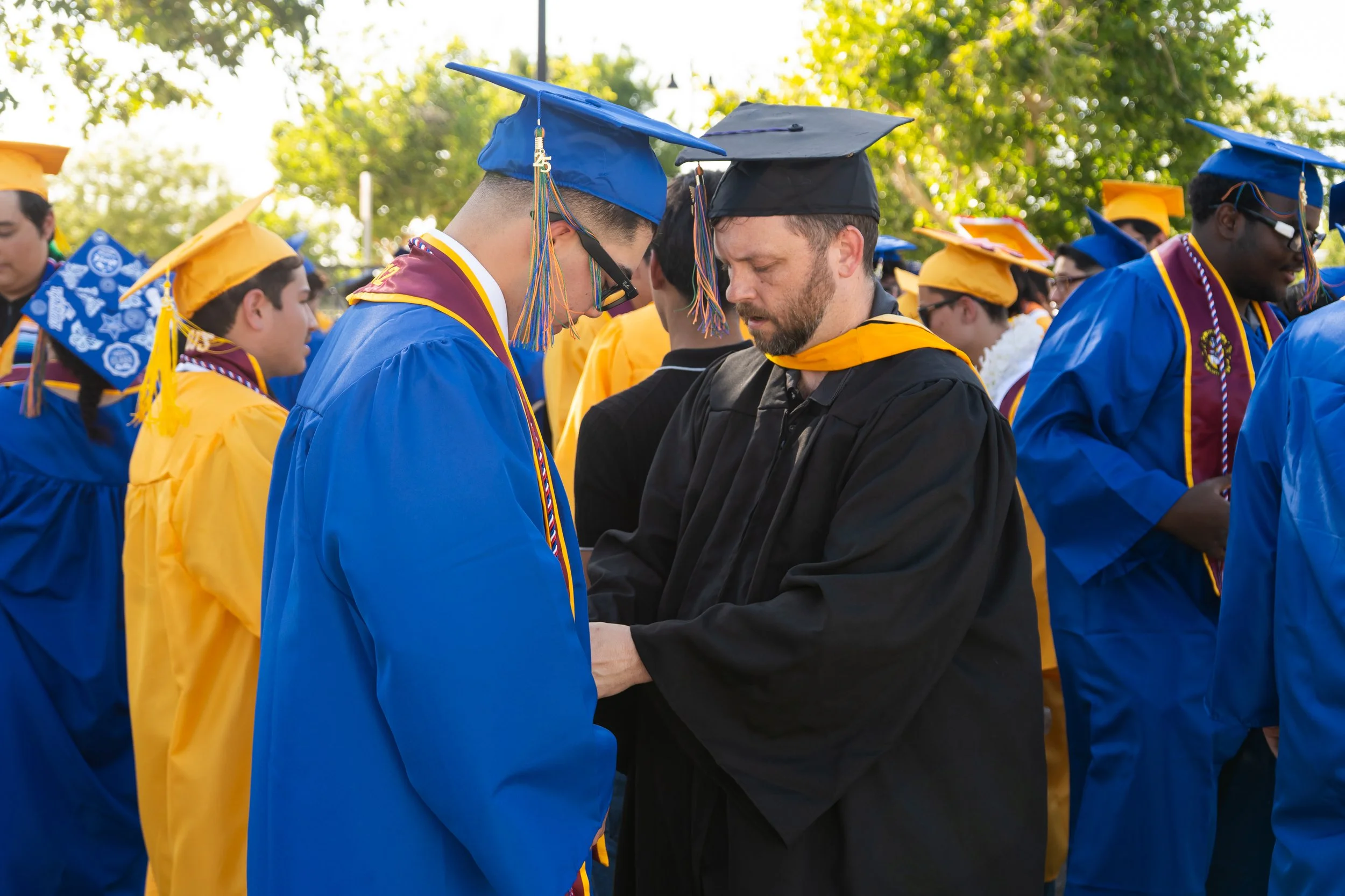 TPAA Graduation teacher and student candid moment.jpg