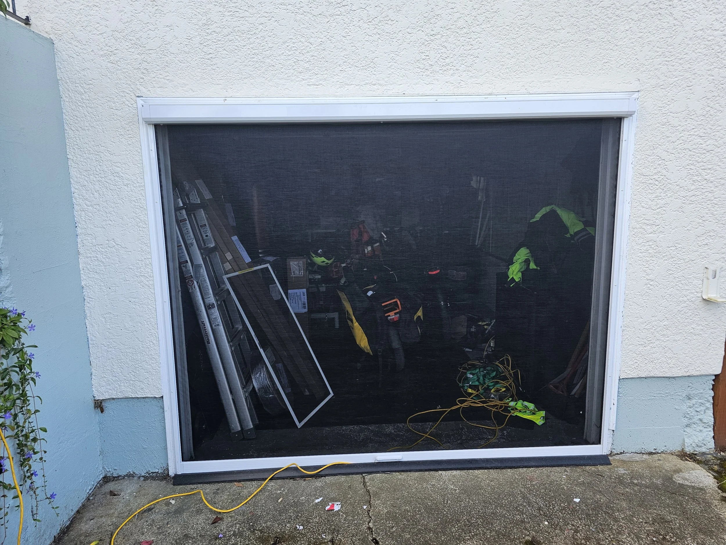 Mirage 3500 on a garage door in Saanich