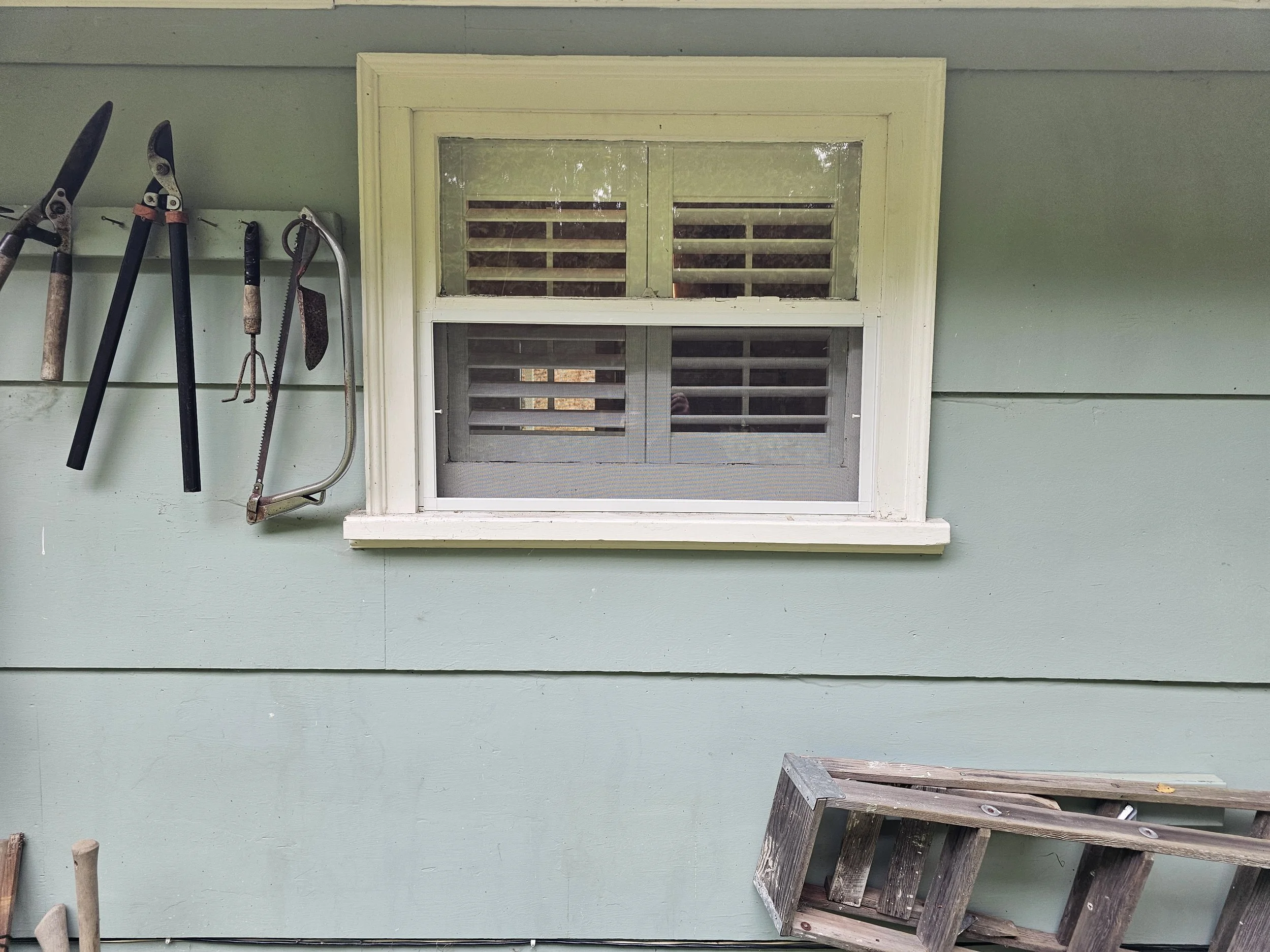 Custom screen for an old wood frame window
