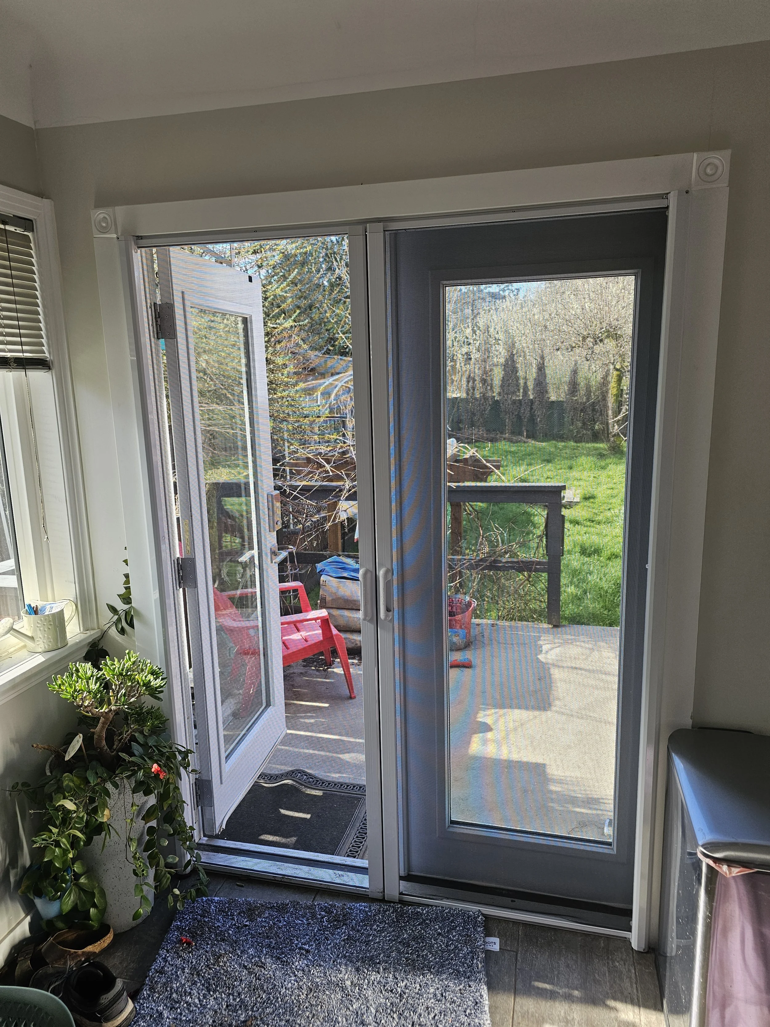 Double pair of Mirage Retractable Doors on a French Door.