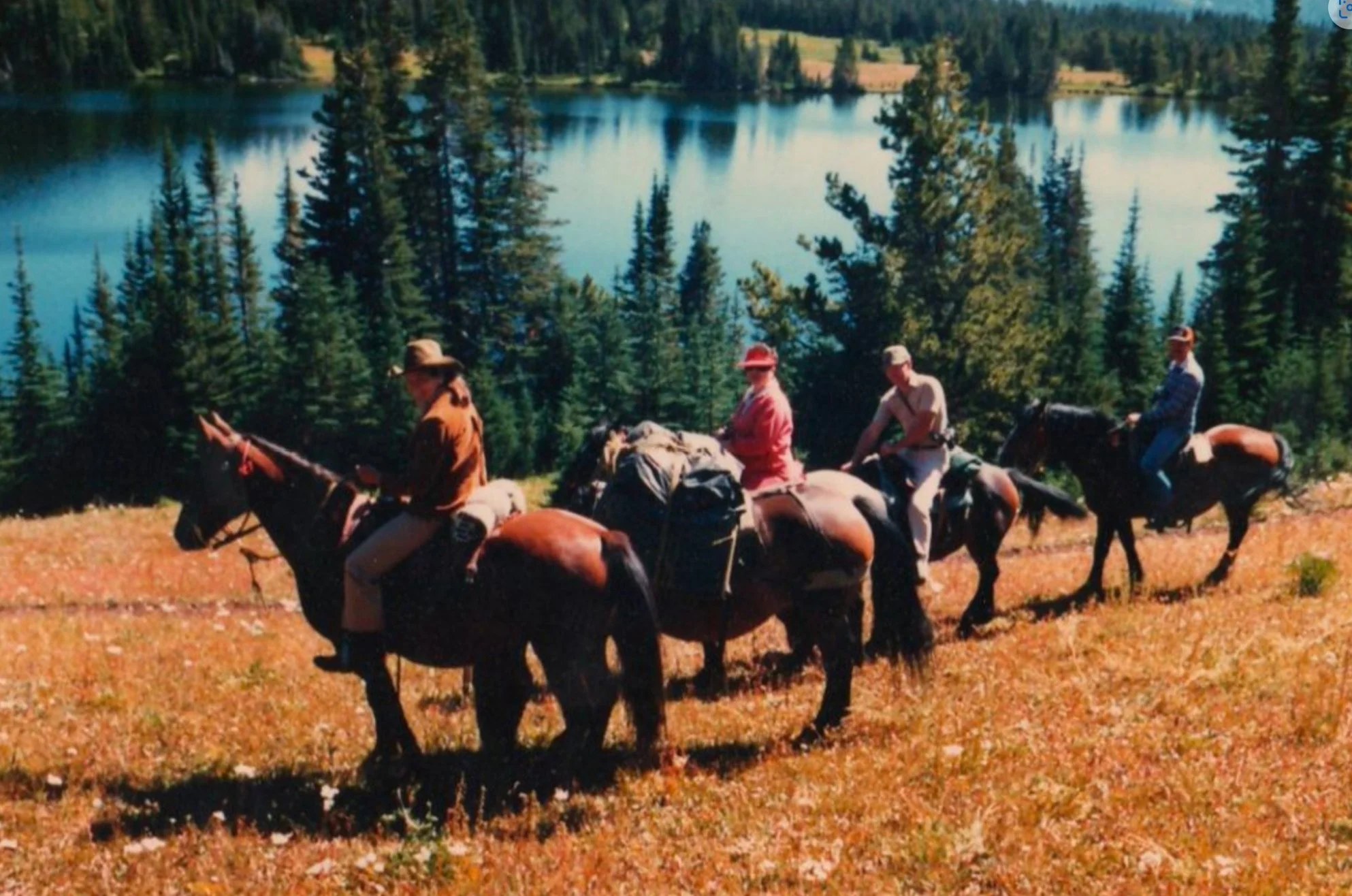 Gerry Riding with Guest above Echo Lake Potato Mountain.jpeg