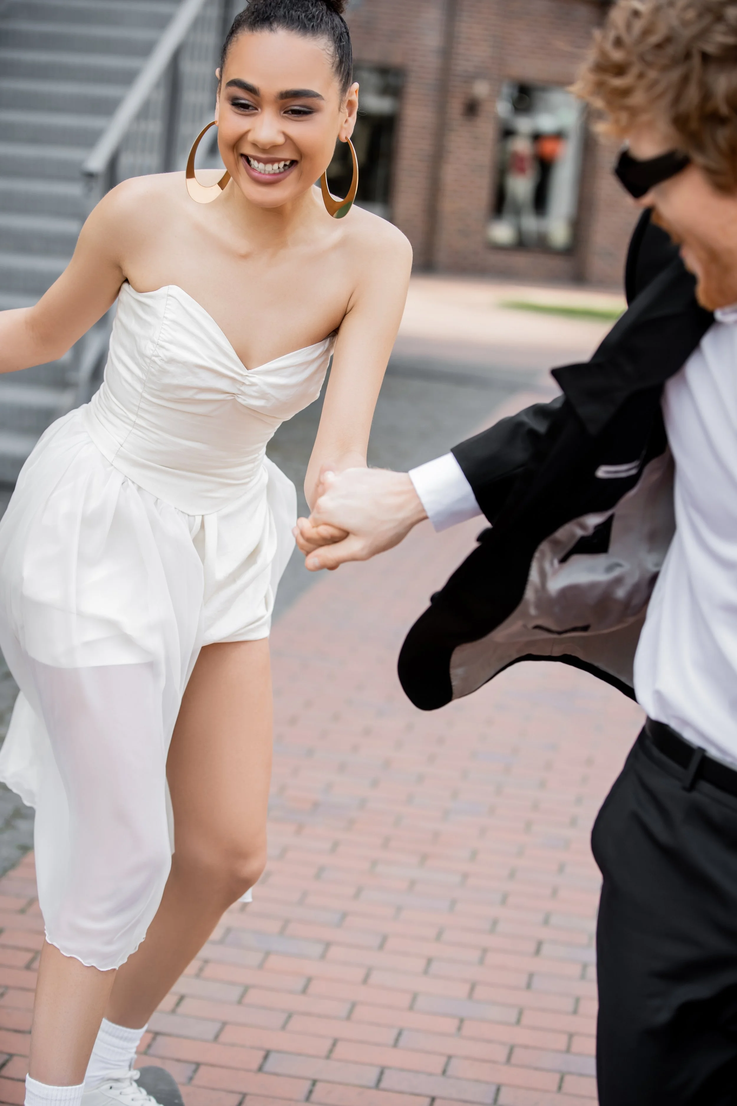 carefree-african-american-woman-in-wedding-dress-h-2023-11-27-05-01-04-utc.jpg