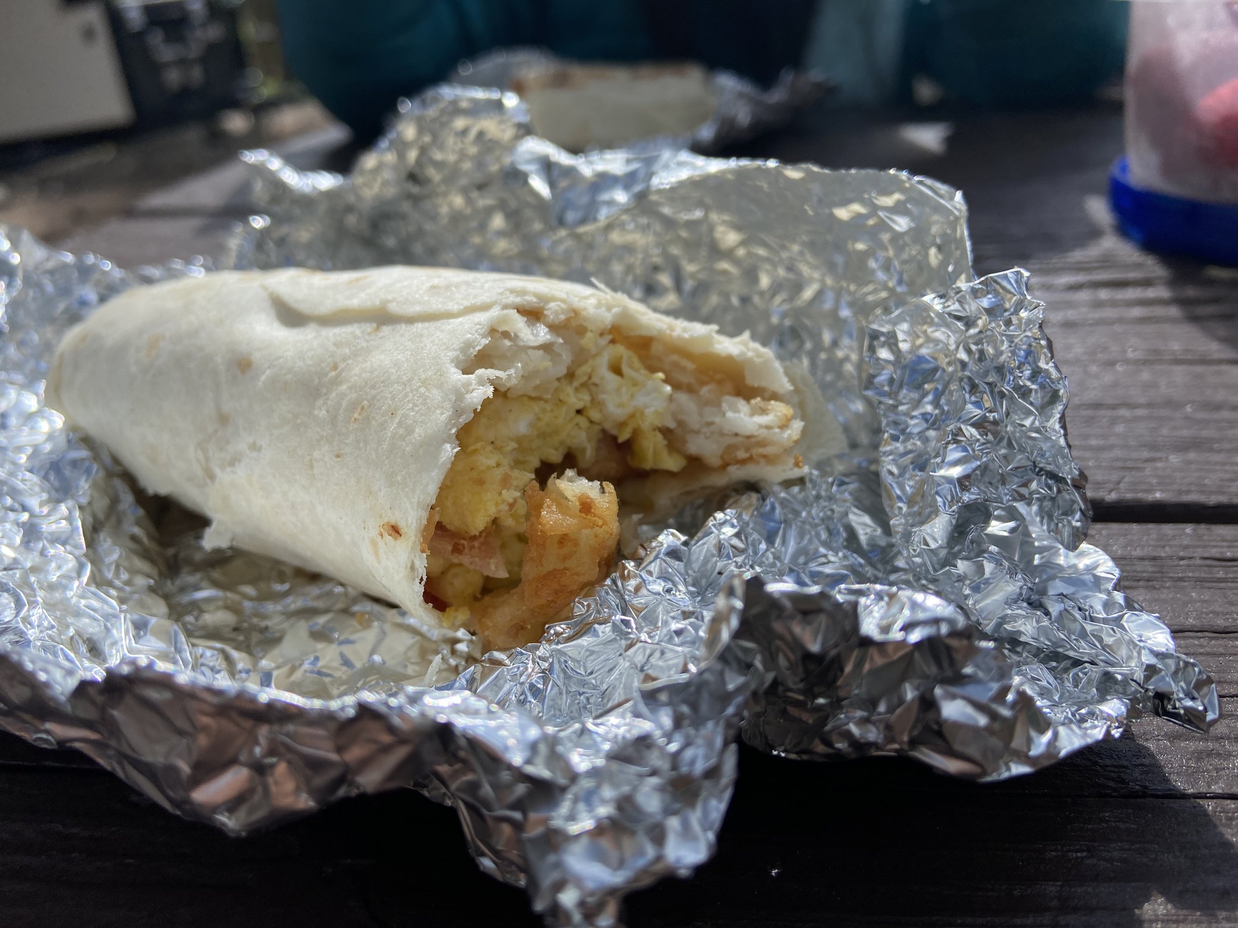 Egg, bacon, and potato breakfast burrito