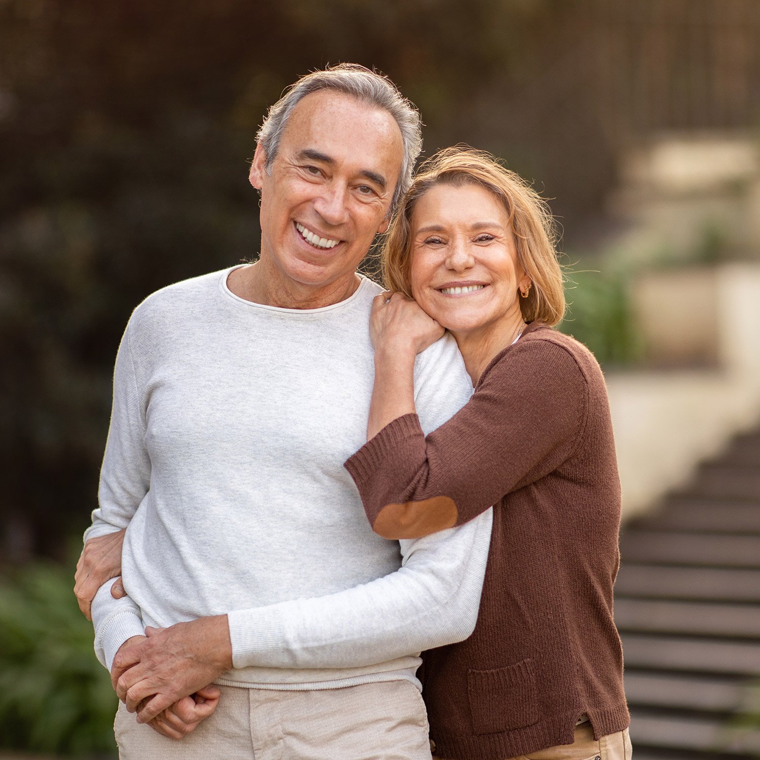 retired couple hugging