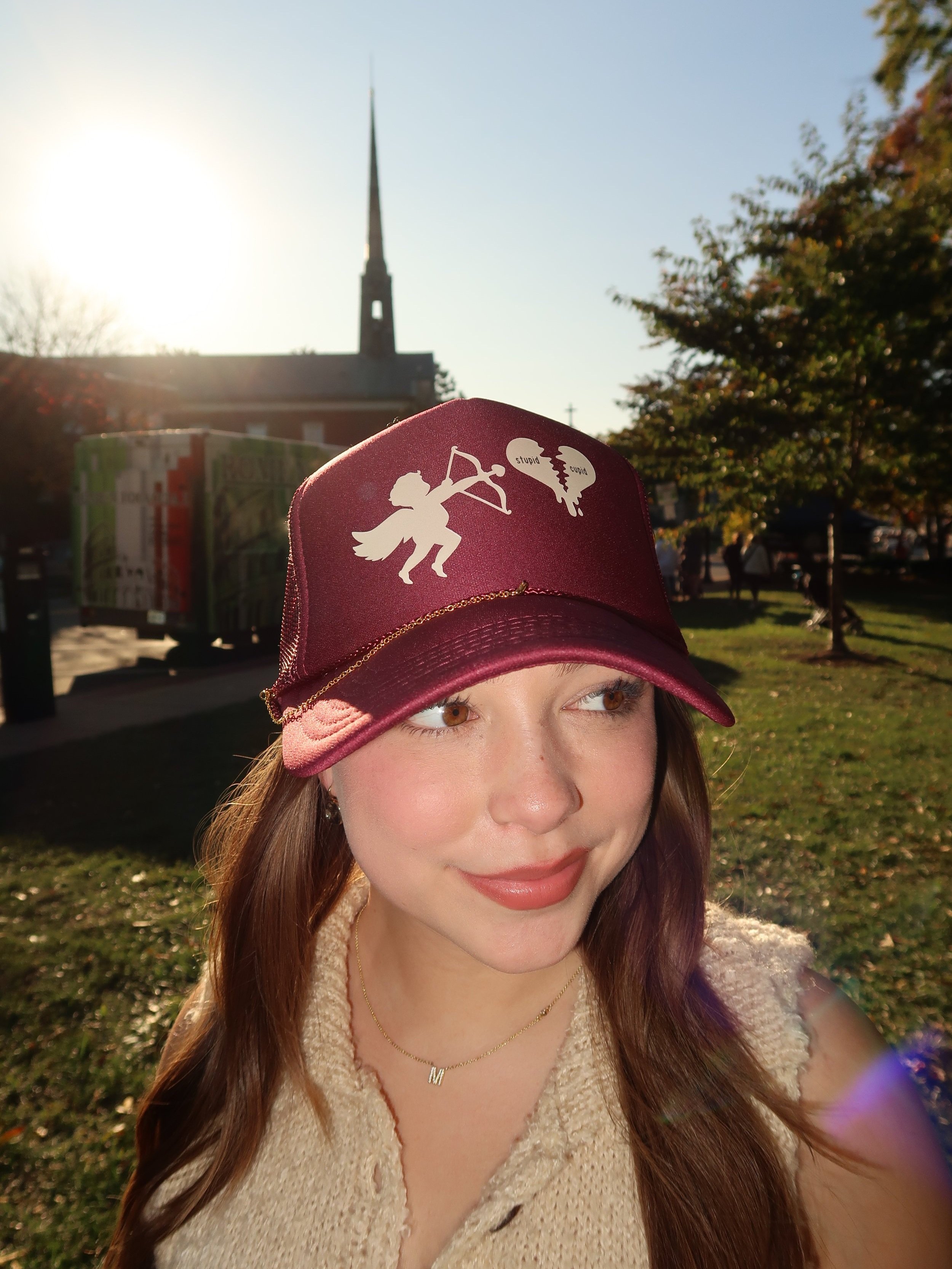 The Stupid Cupid Maroon Trucker Hat: Good Luck Babe - charmer design bar