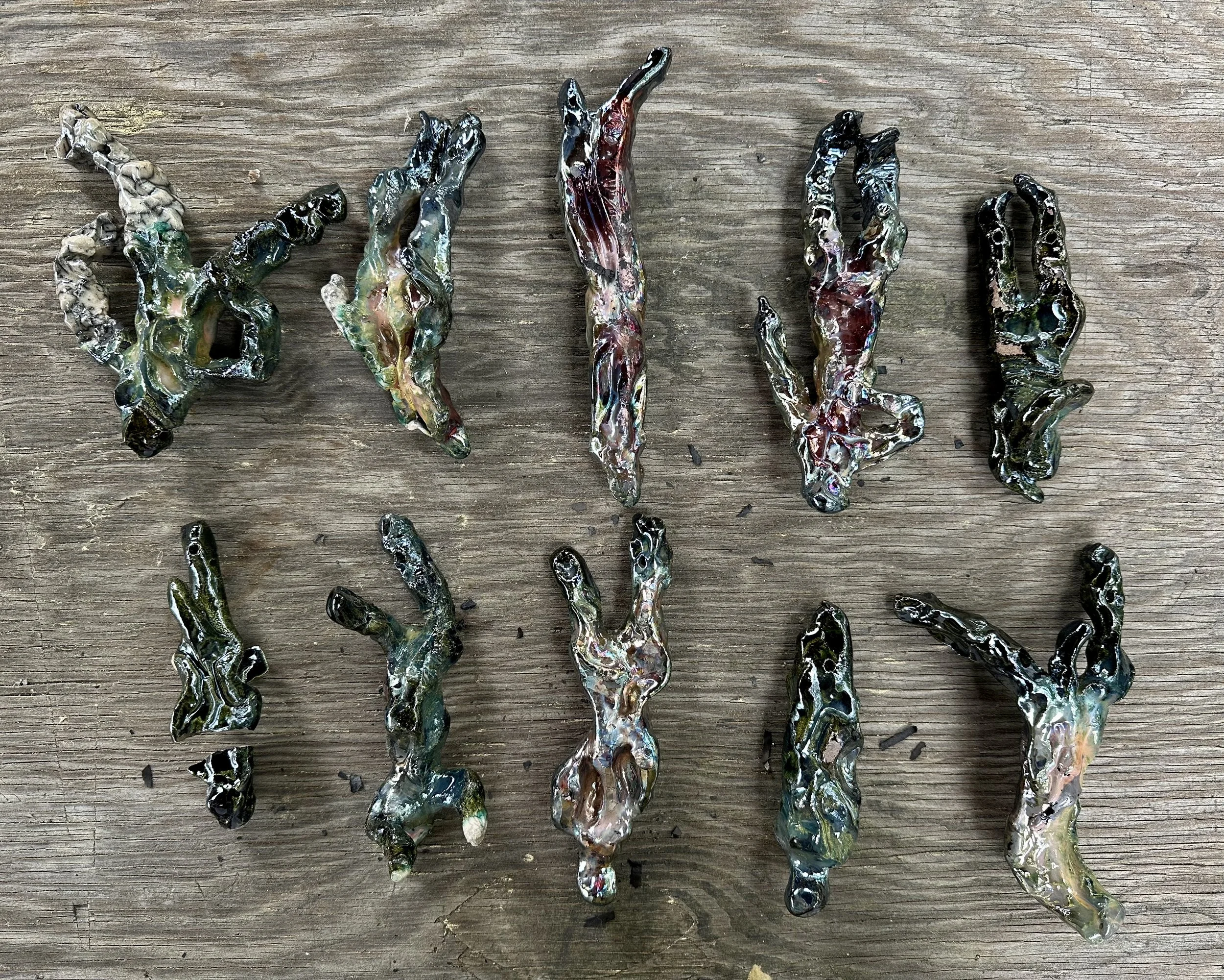 Raku figures, 2025.  3 x10cm.