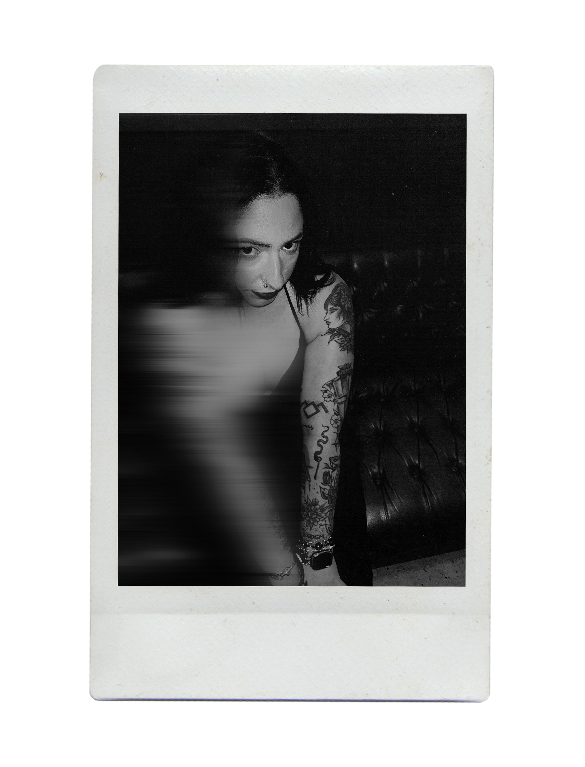 black and white photo of Tara Adrian Belmont with a blur on the left