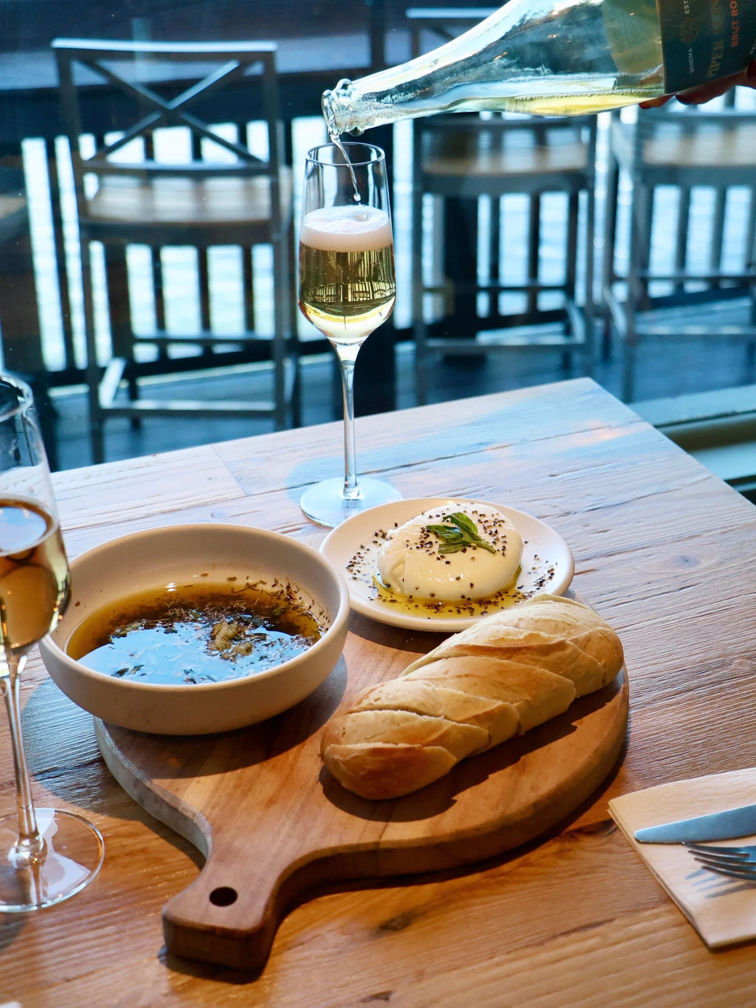 🥂 Burrata, bubbles, and bread: the ultimate weekend ritual!

🥖 Start your evening right with our fresh burrata&mdash;served drizzled with olive oil and herbs, available with warm bread and our famous house dipping oil, or as a delicious addition to
