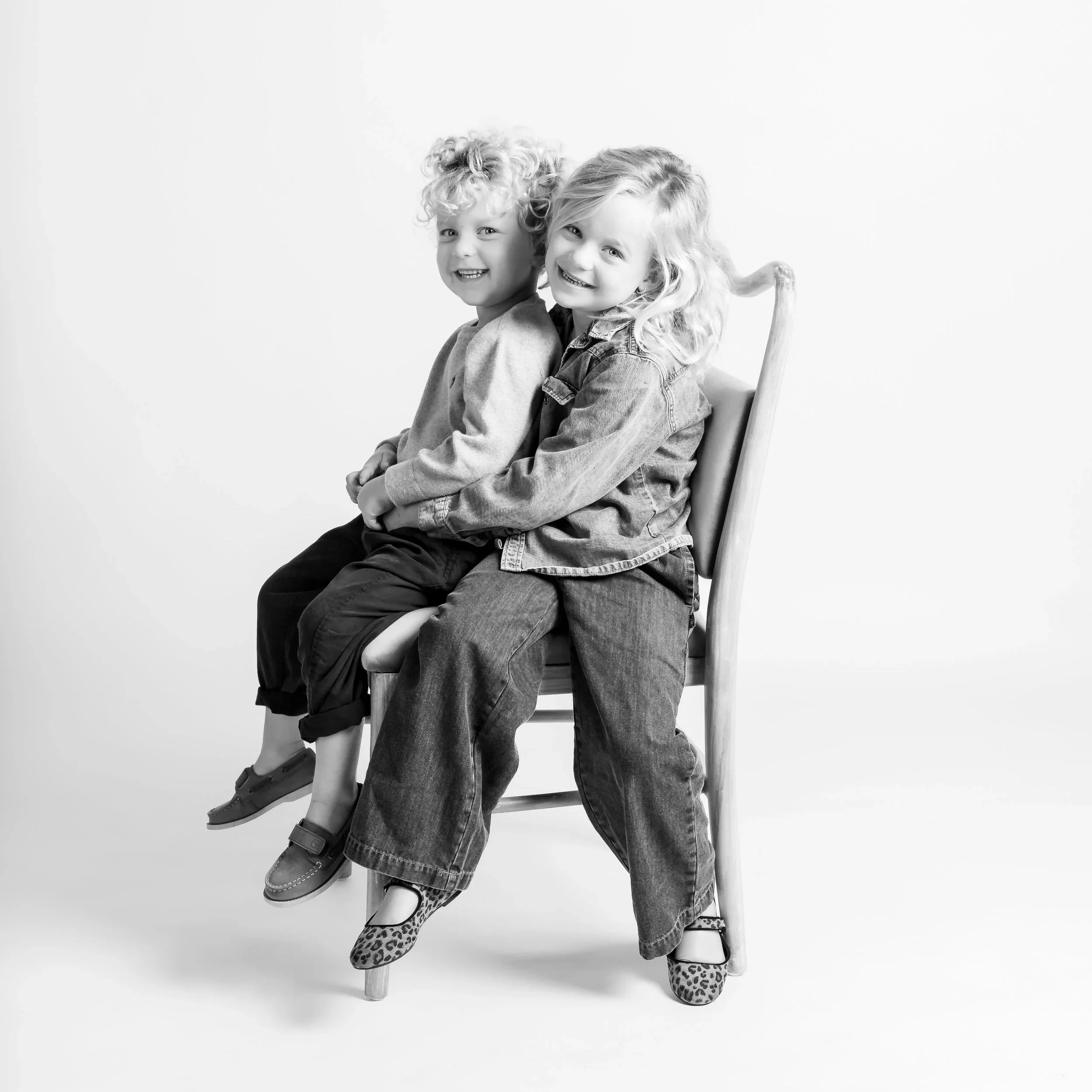 Classic black and white studio family photoshoot