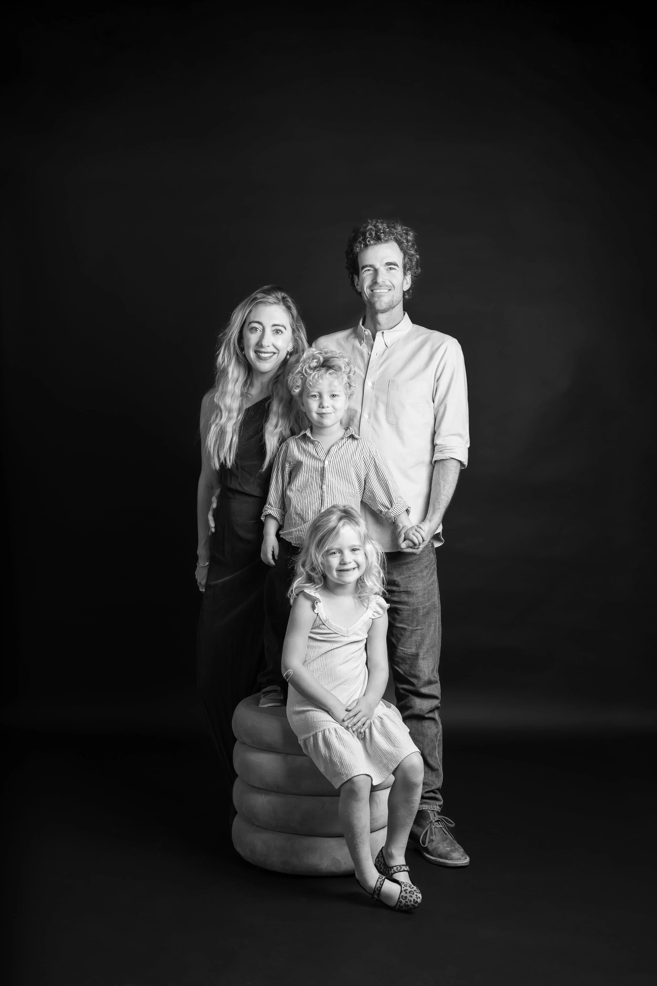 Classic black and white studio family photoshoot