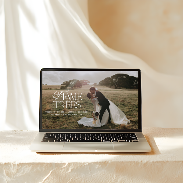 Laptop displaying a wedding stylists website homepage
